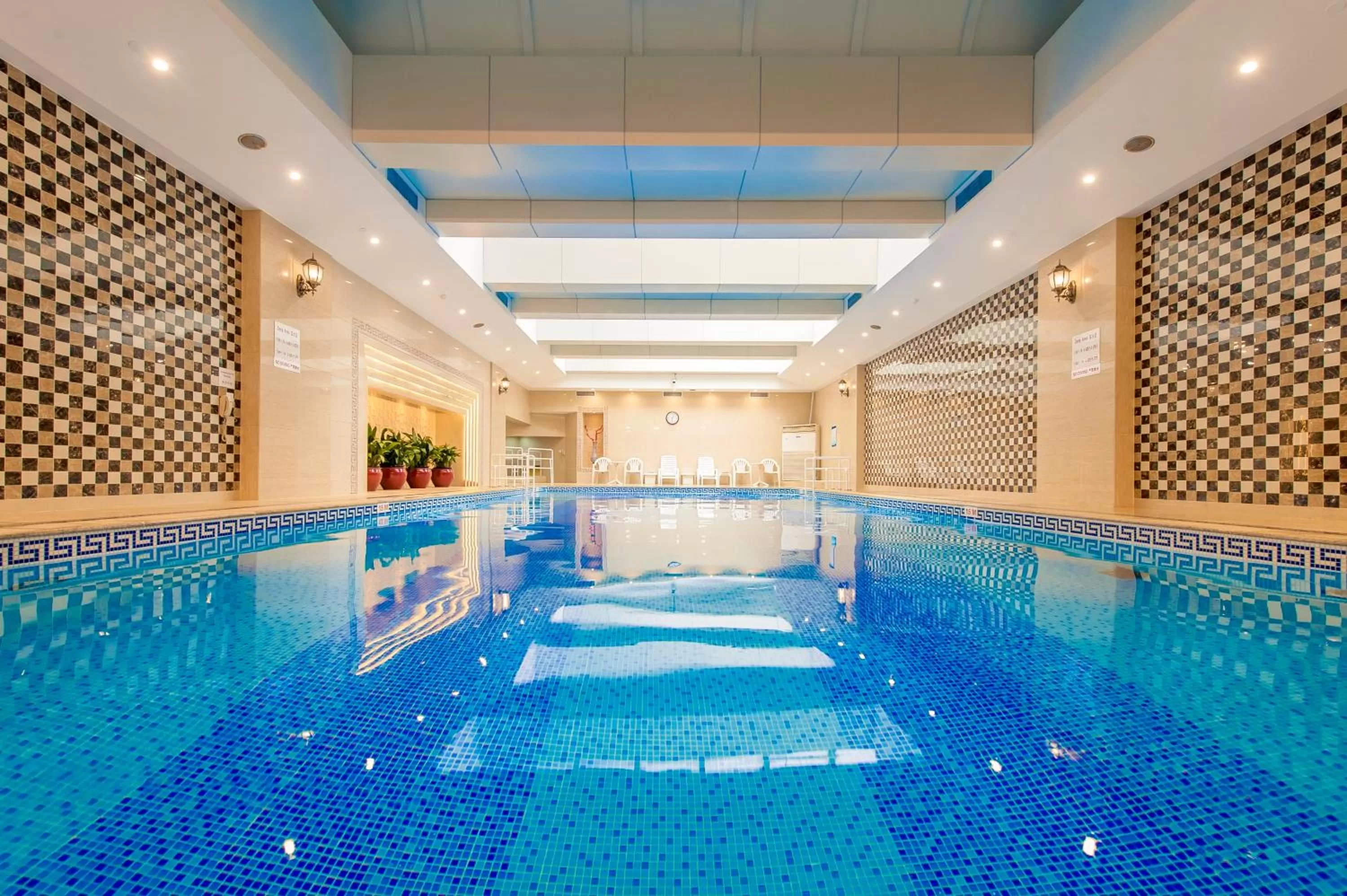 Swimming pool in Crowne Plaza Shanghai by IHG