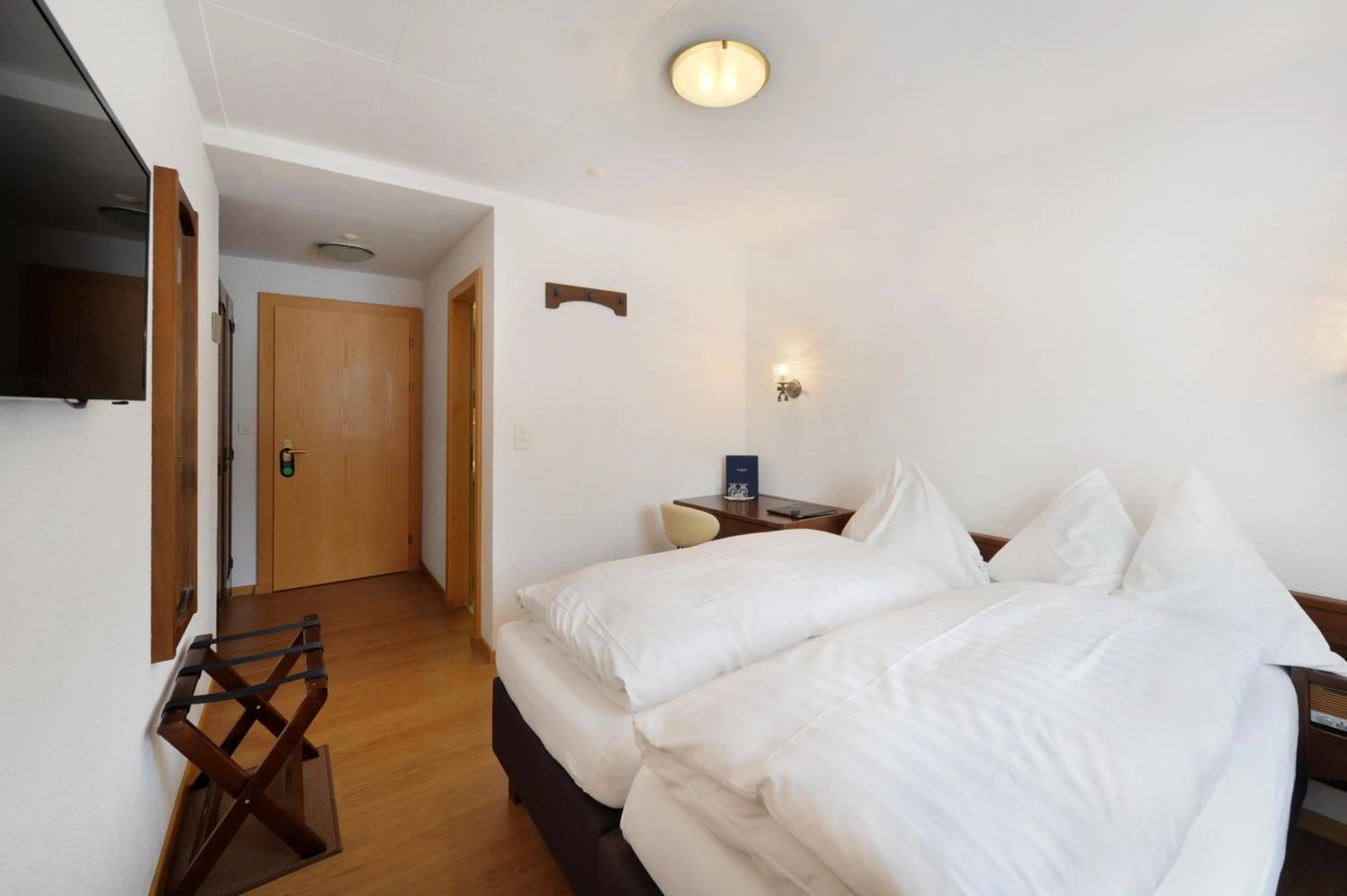 Bedroom, Bed in Hotel Dischma