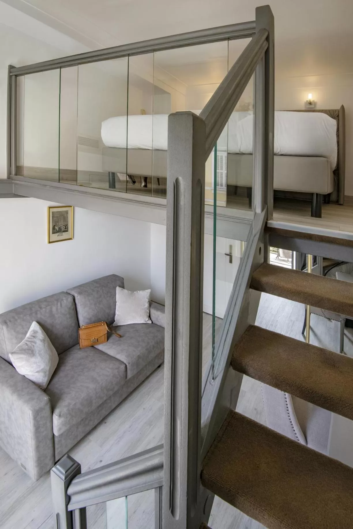 Photo of the whole room, Bed in GOLDEN TULIP CANNES HOTEL de PARIS