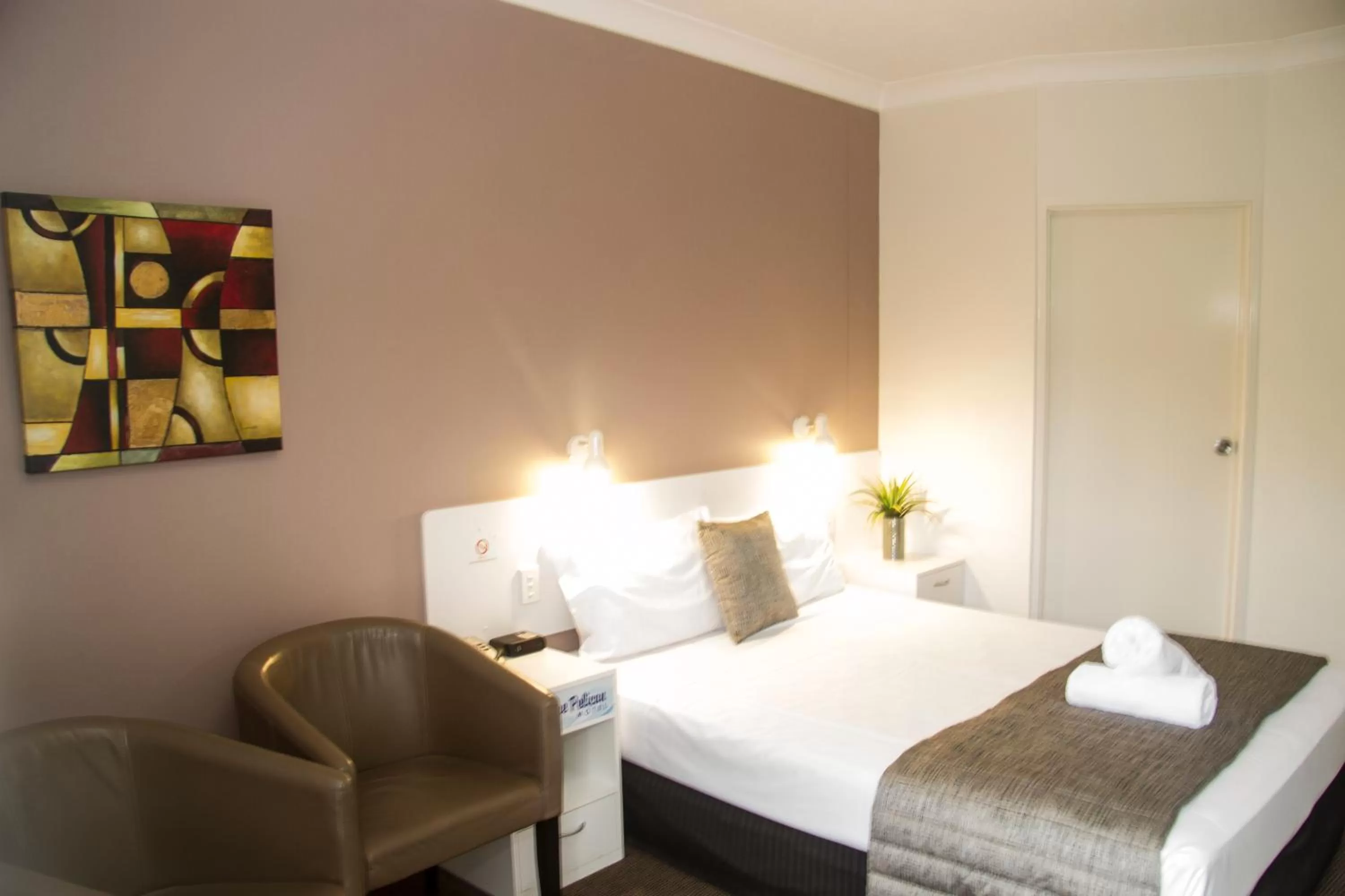 Bed in Blue Pelican Motel