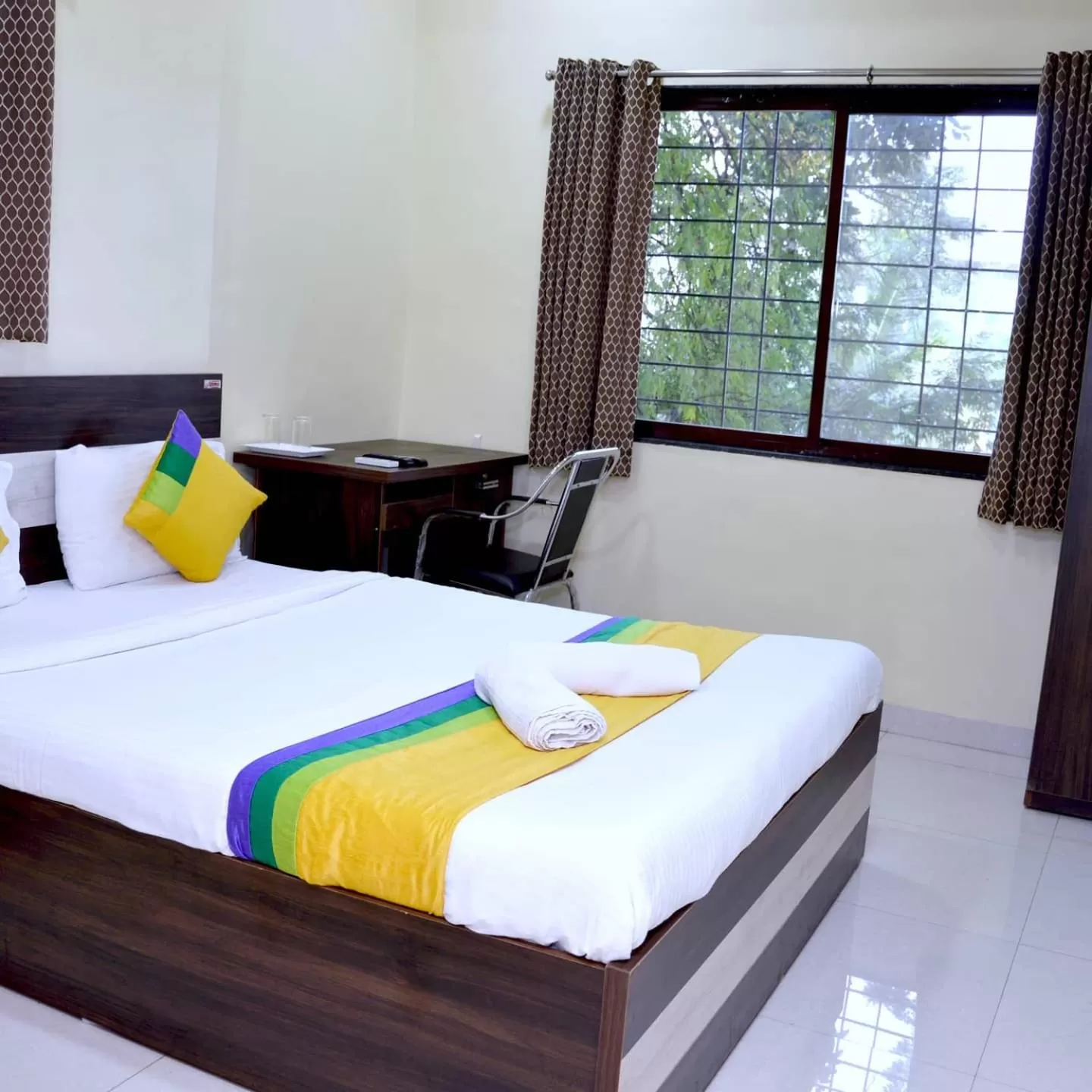 Photo of the whole room, Bed in Hotel Bestow Inn Koregaon Park Pune -Near Osho Ashram