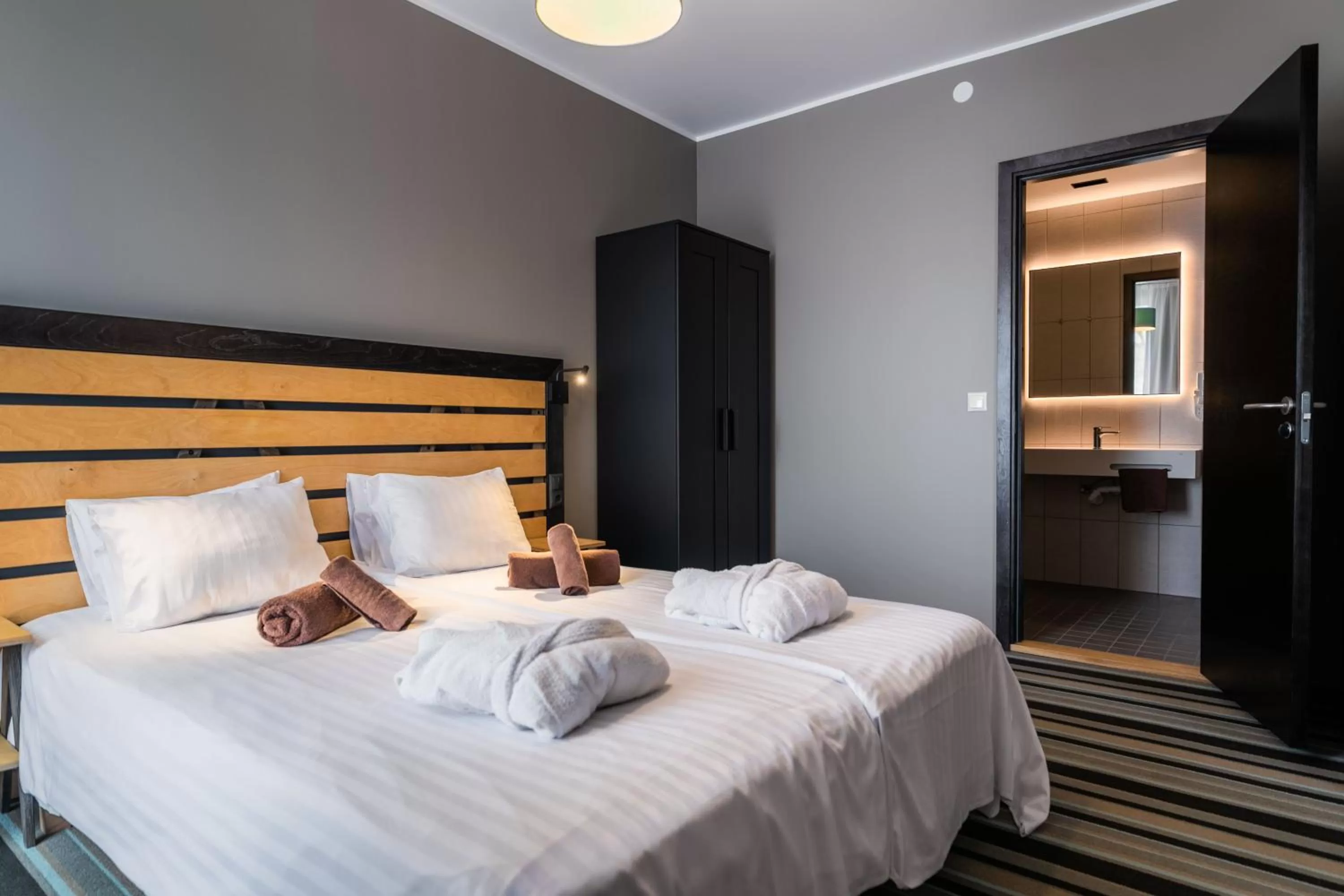 Bed in Johan Design & SPA Hotel