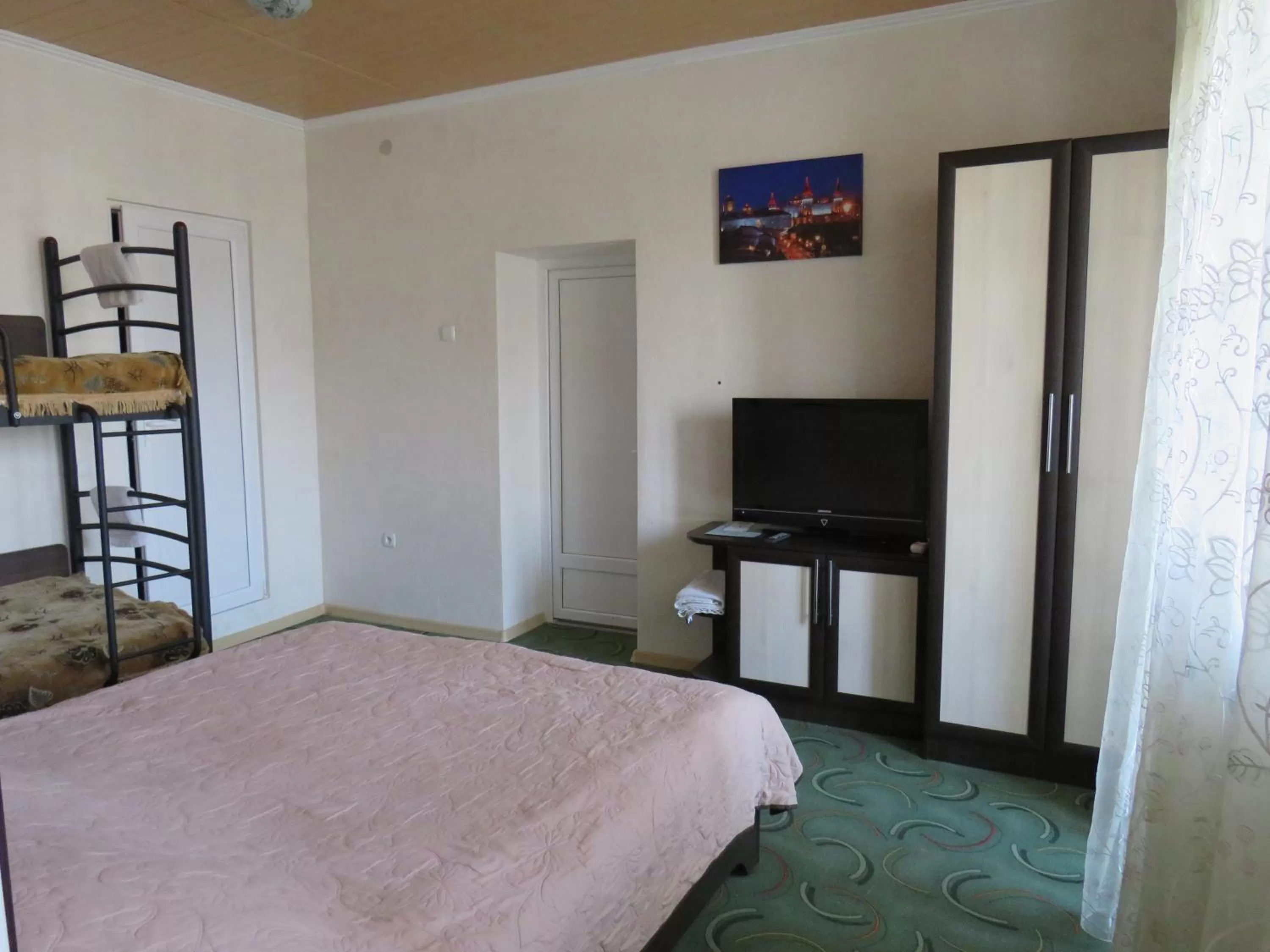 Bed in Monte-Kristo Hotel