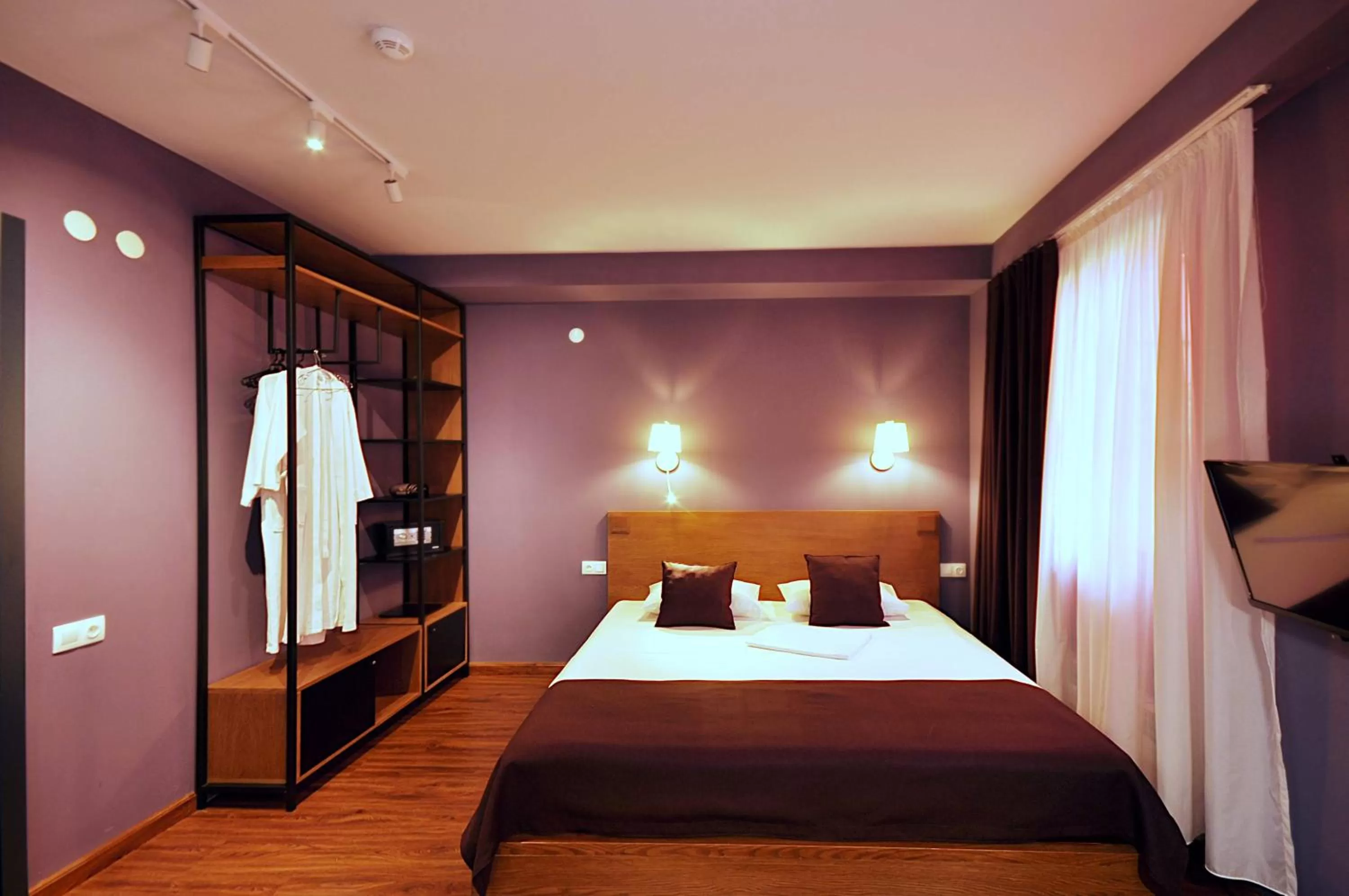 Bed in Elle Boutique Hotel