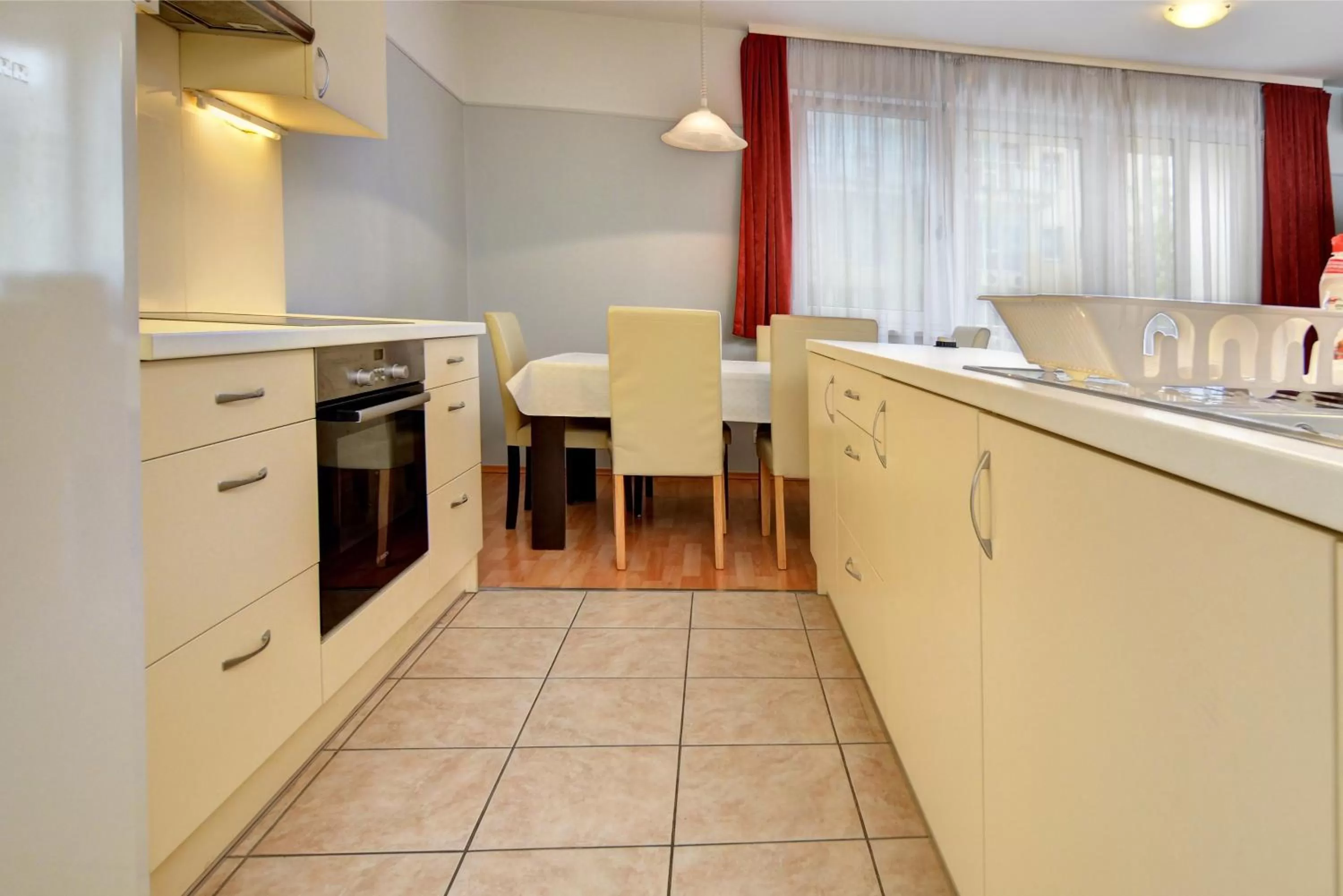 Kitchen or kitchenette in Agape Apartments