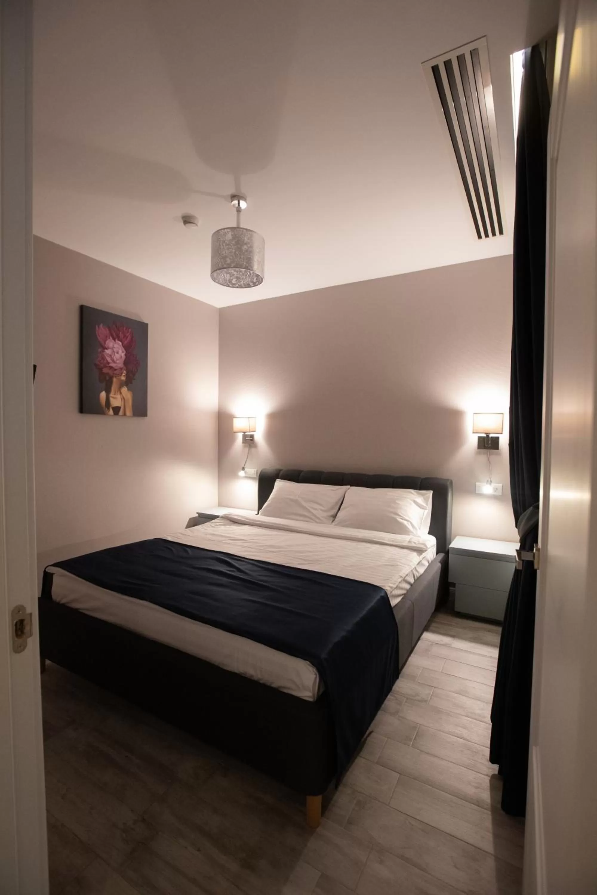 Bedroom in Omnia Apartments