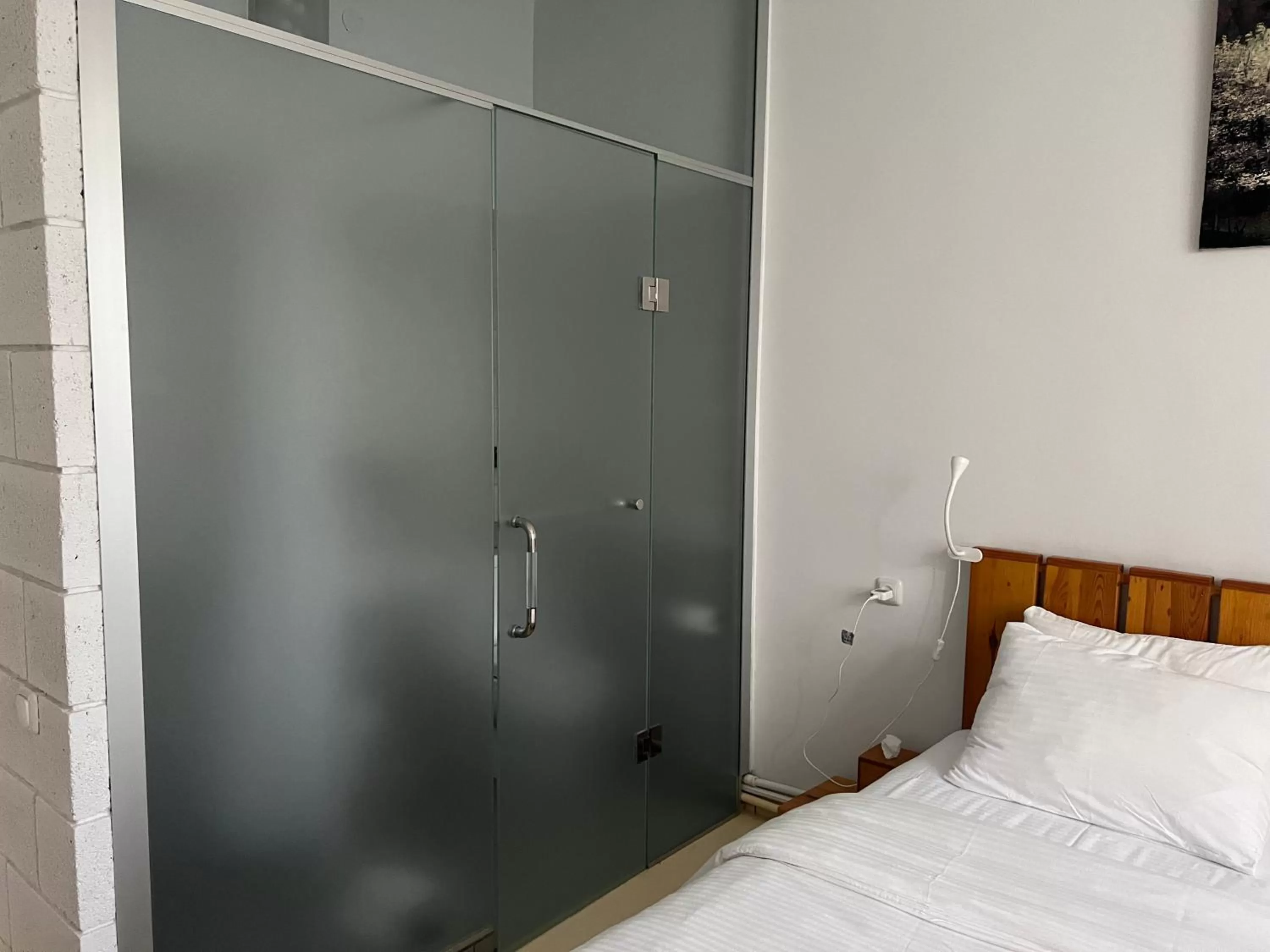 Bed in Green Stone Boutique Hotel