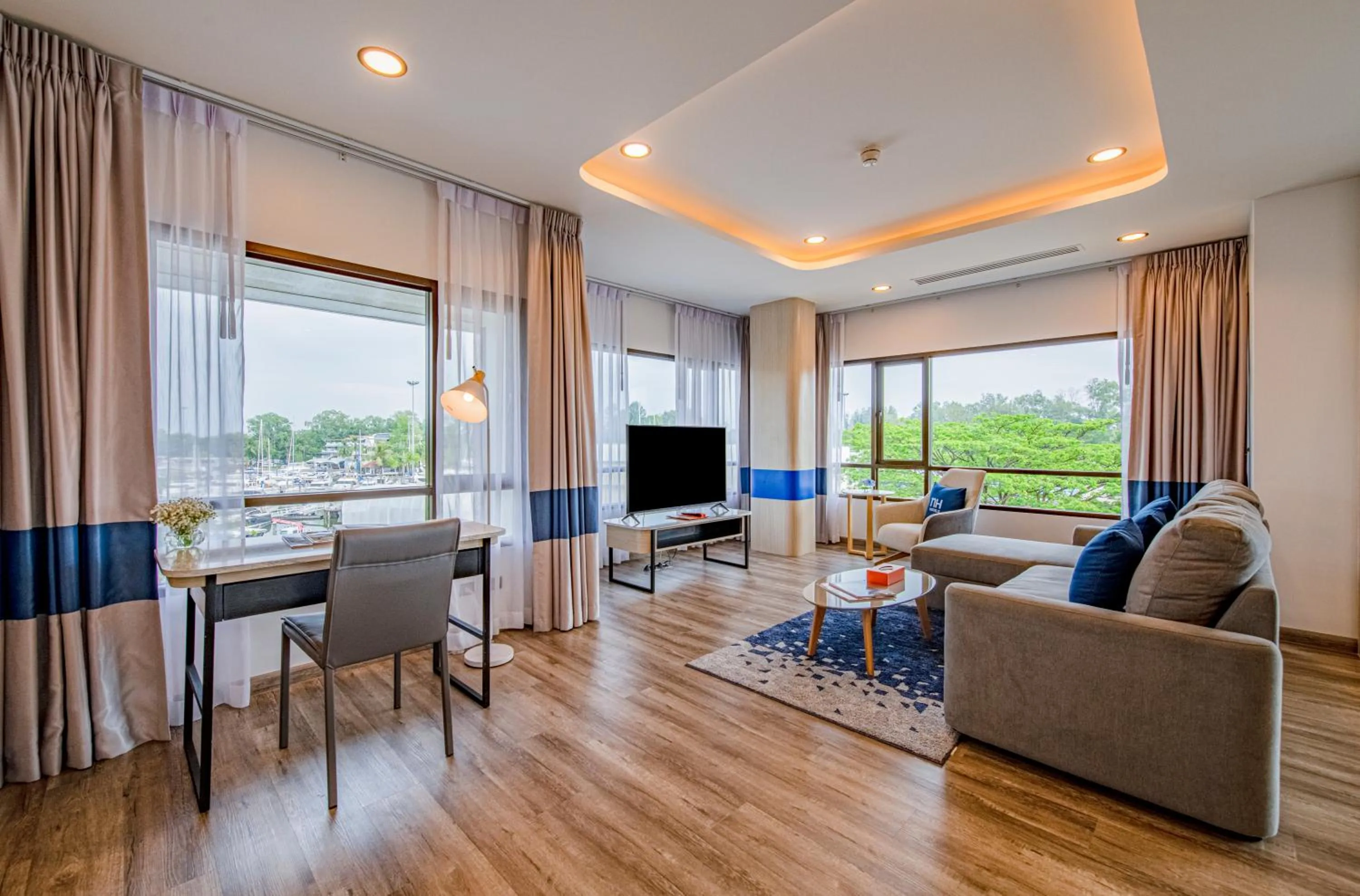 Living room in NH Boat Lagoon Phuket Resort