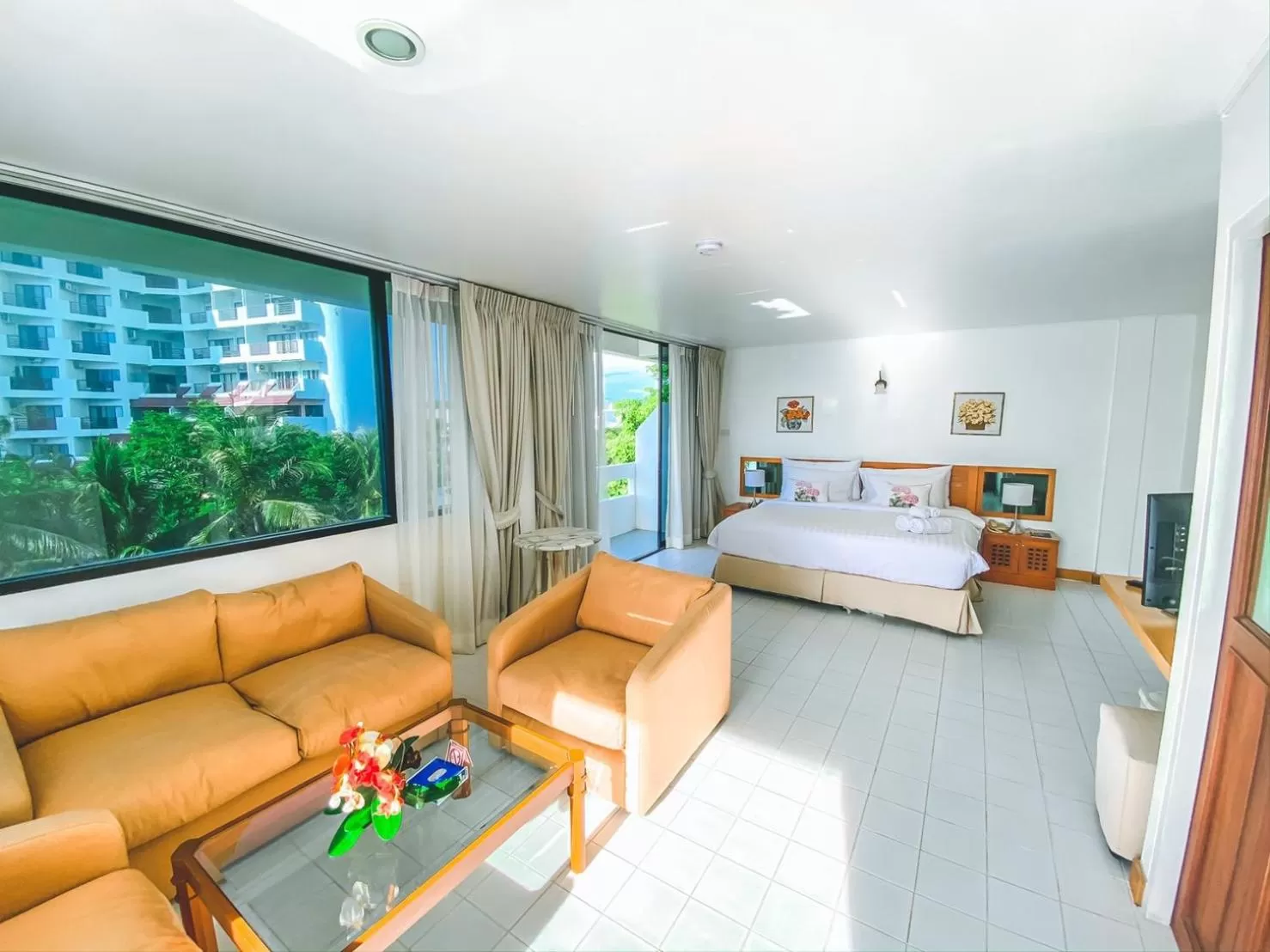 Seating area, Bed in Nern Chalet Beachfront Hotel