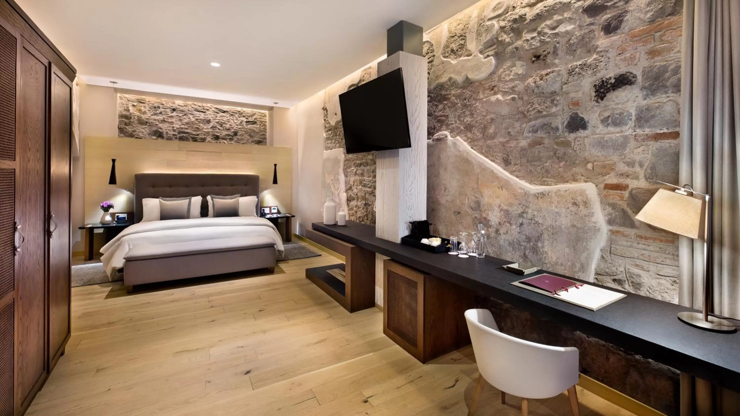 Bed in Cartesiano Boutique & Wellness Hotel