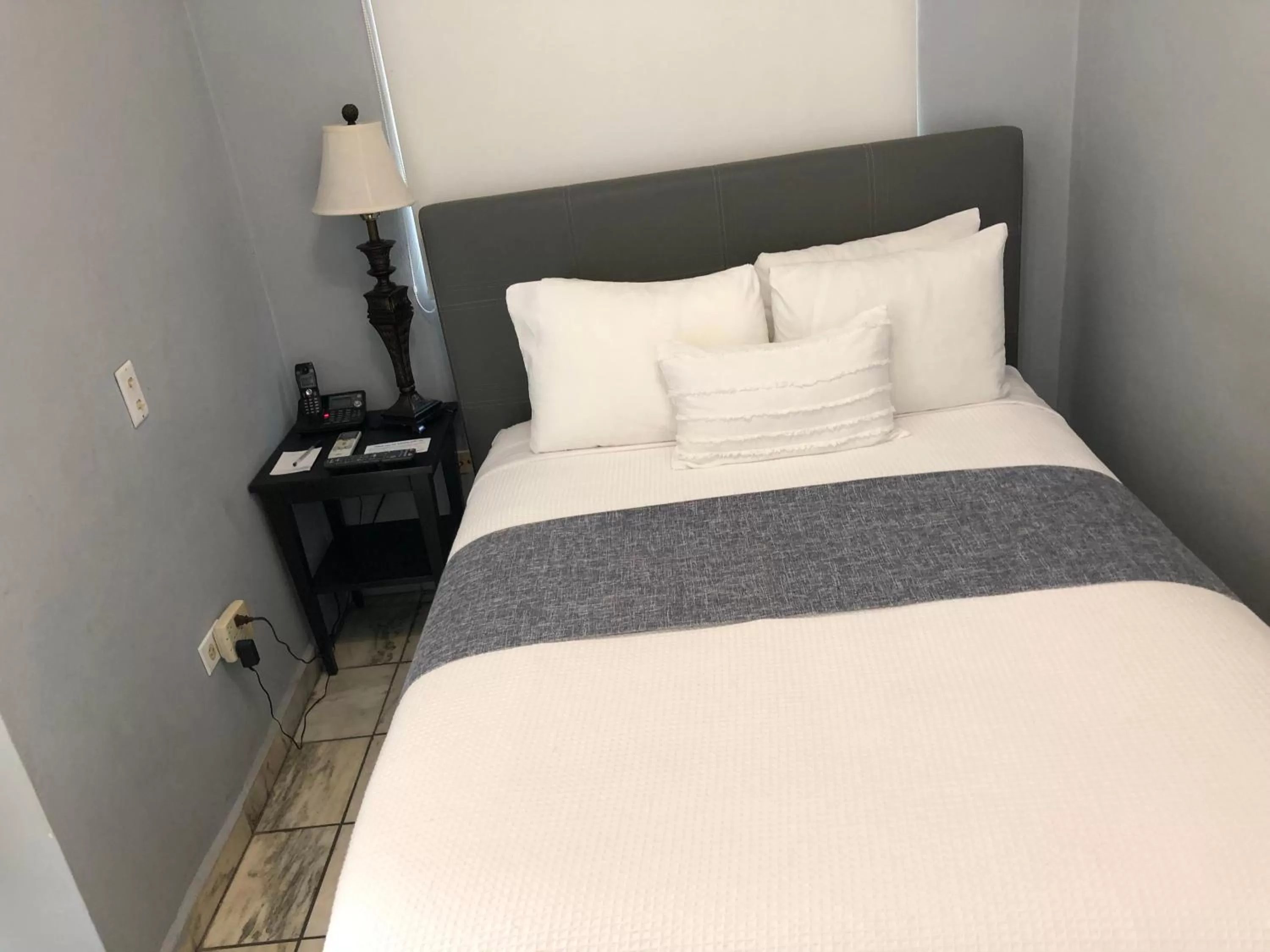 Bed in Coral Princess Hotel