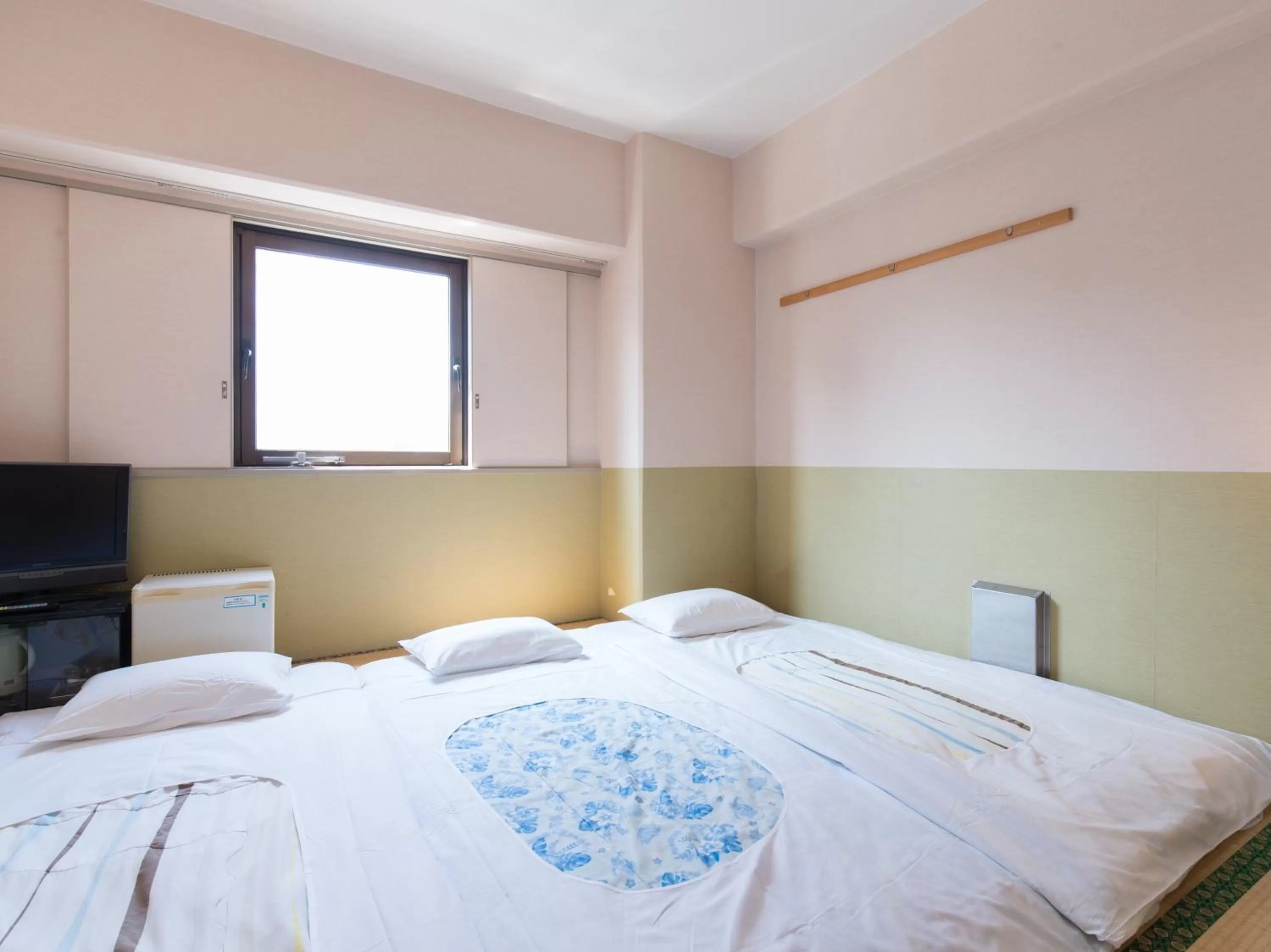 Photo of the whole room, Bed in Tabist Hotel Tetora Kitakyushu