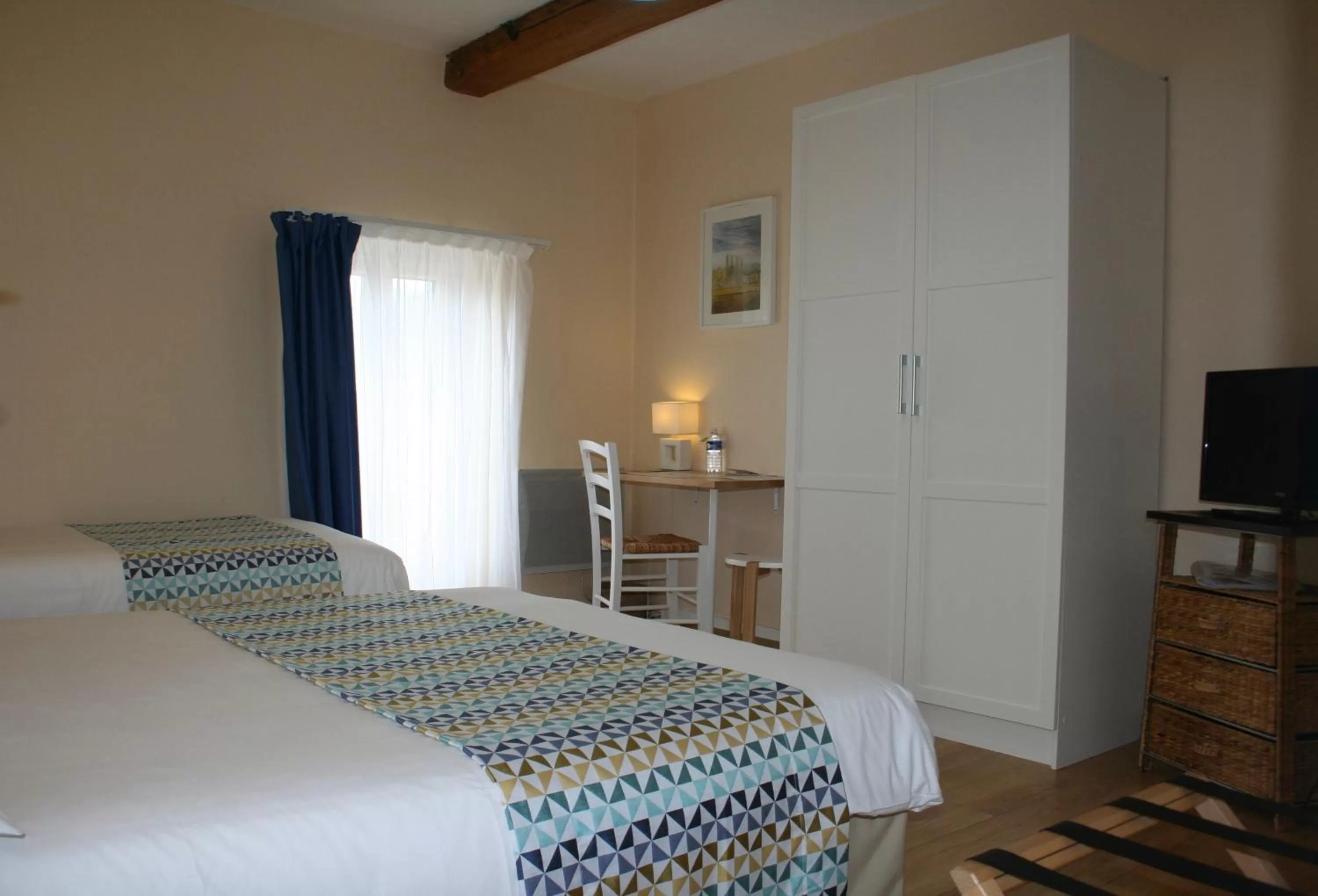 Photo of the whole room, Bed in Logis Hôtel Le Cygne