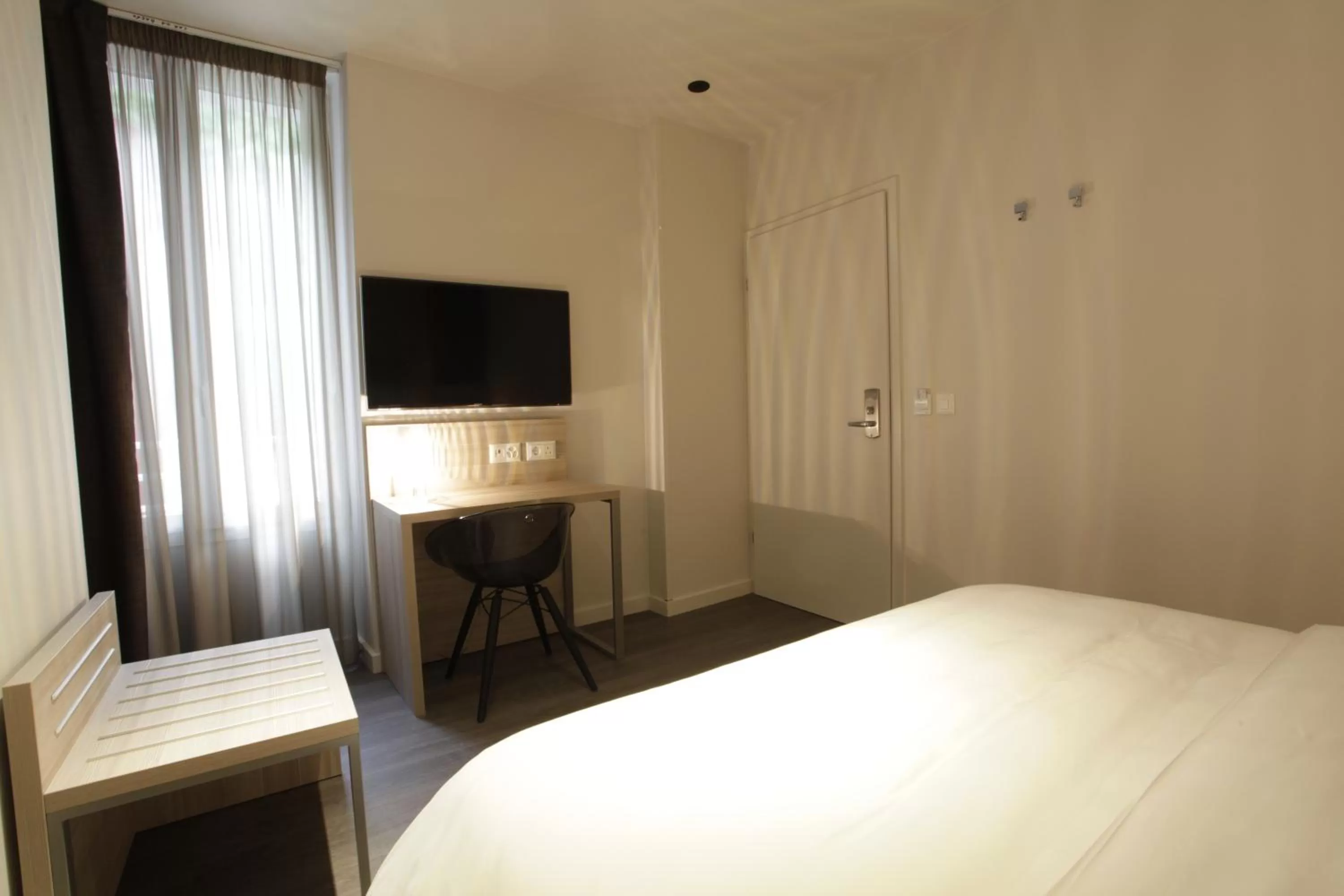 Bed in Chez Maman Hotel & Restaurant