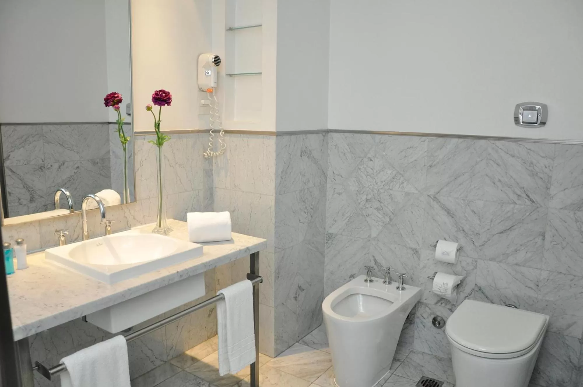 Bathroom in Broadway Hotel & Suites