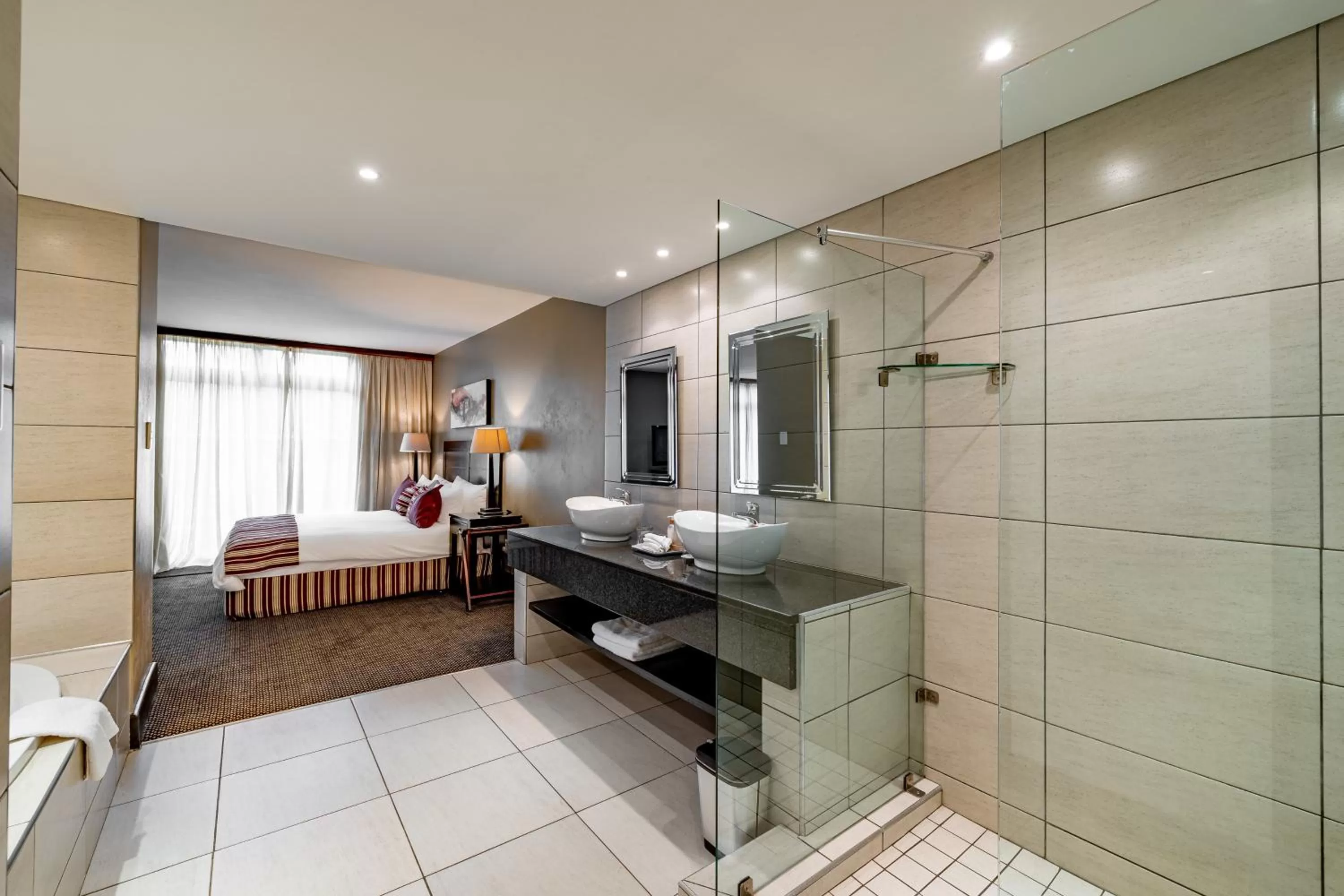 Bathroom in African Sky Hotels - Pine Lake Inn