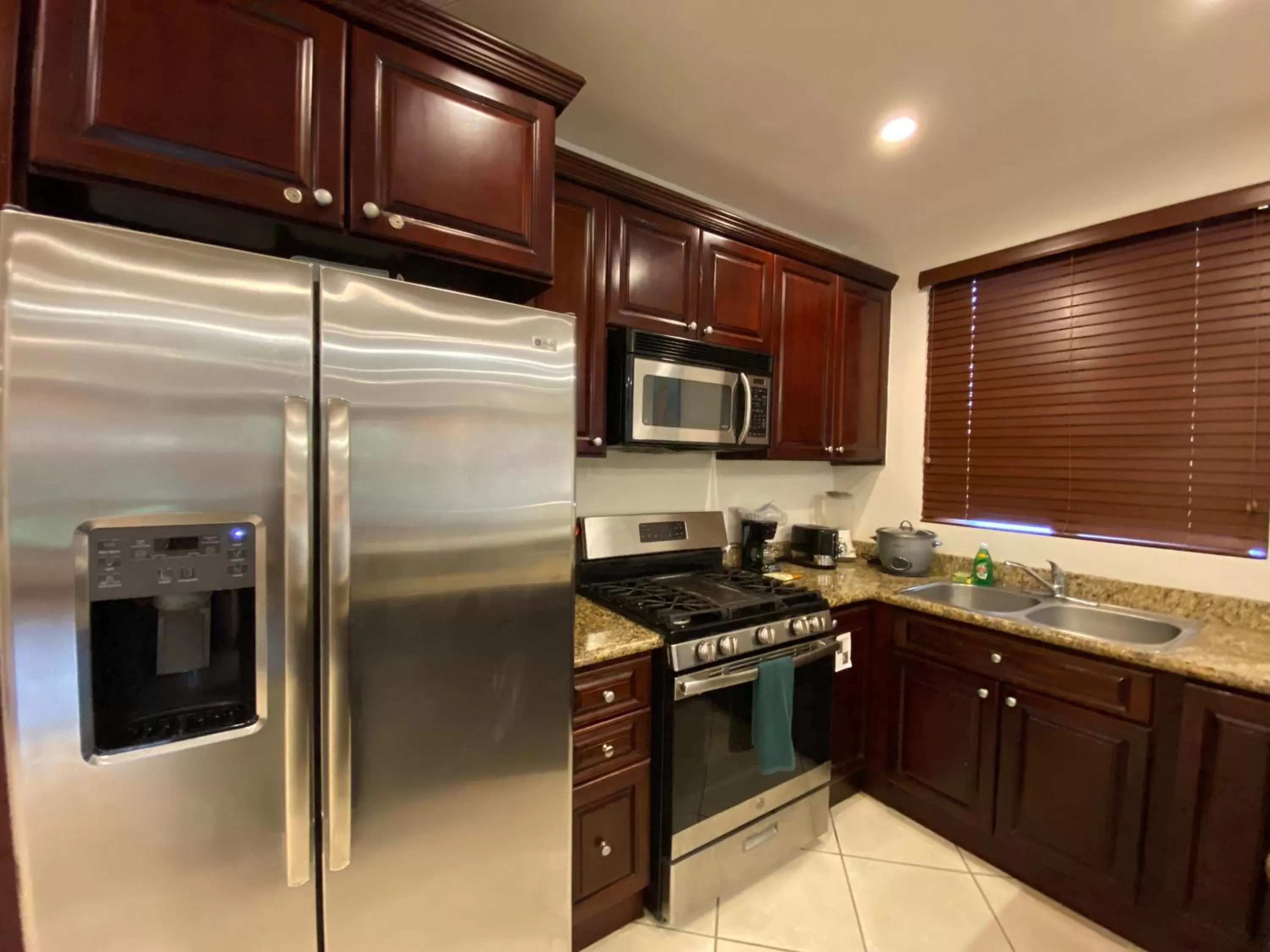Kitchen or kitchenette in Monte Carlo Luxury Condominiums