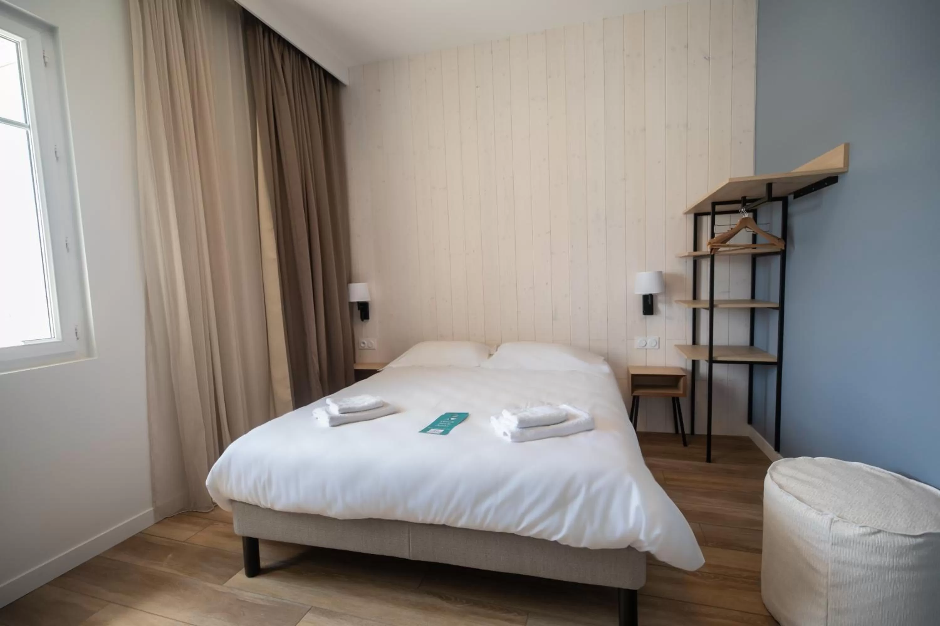 Bed in Hôtel de la Baie