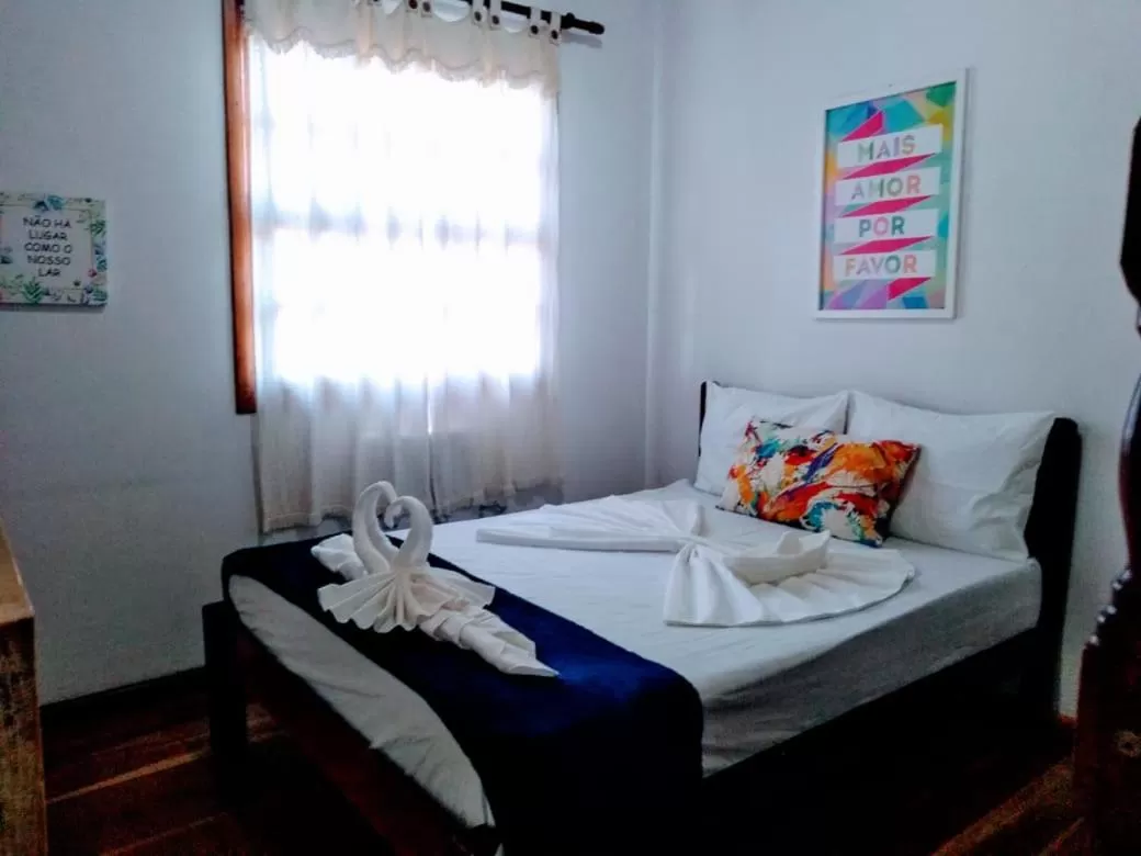 Bed in Pousada Beluga