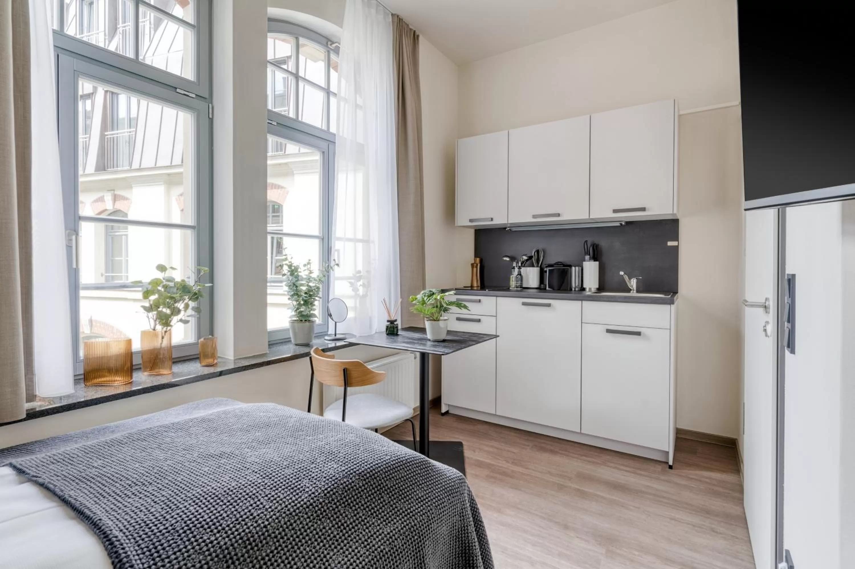 Kitchen or kitchenette in Limehome Leipzig Oelßner's Hof