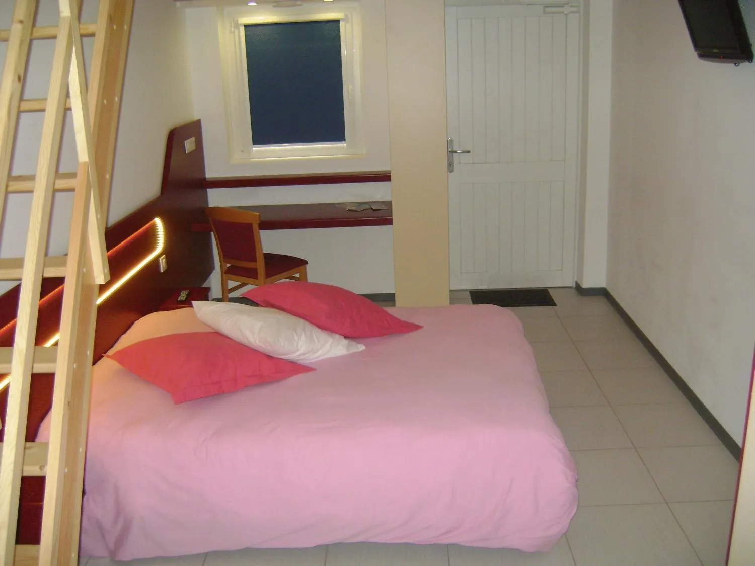 Photo of the whole room, Bed in Hôtel Le Richevaux