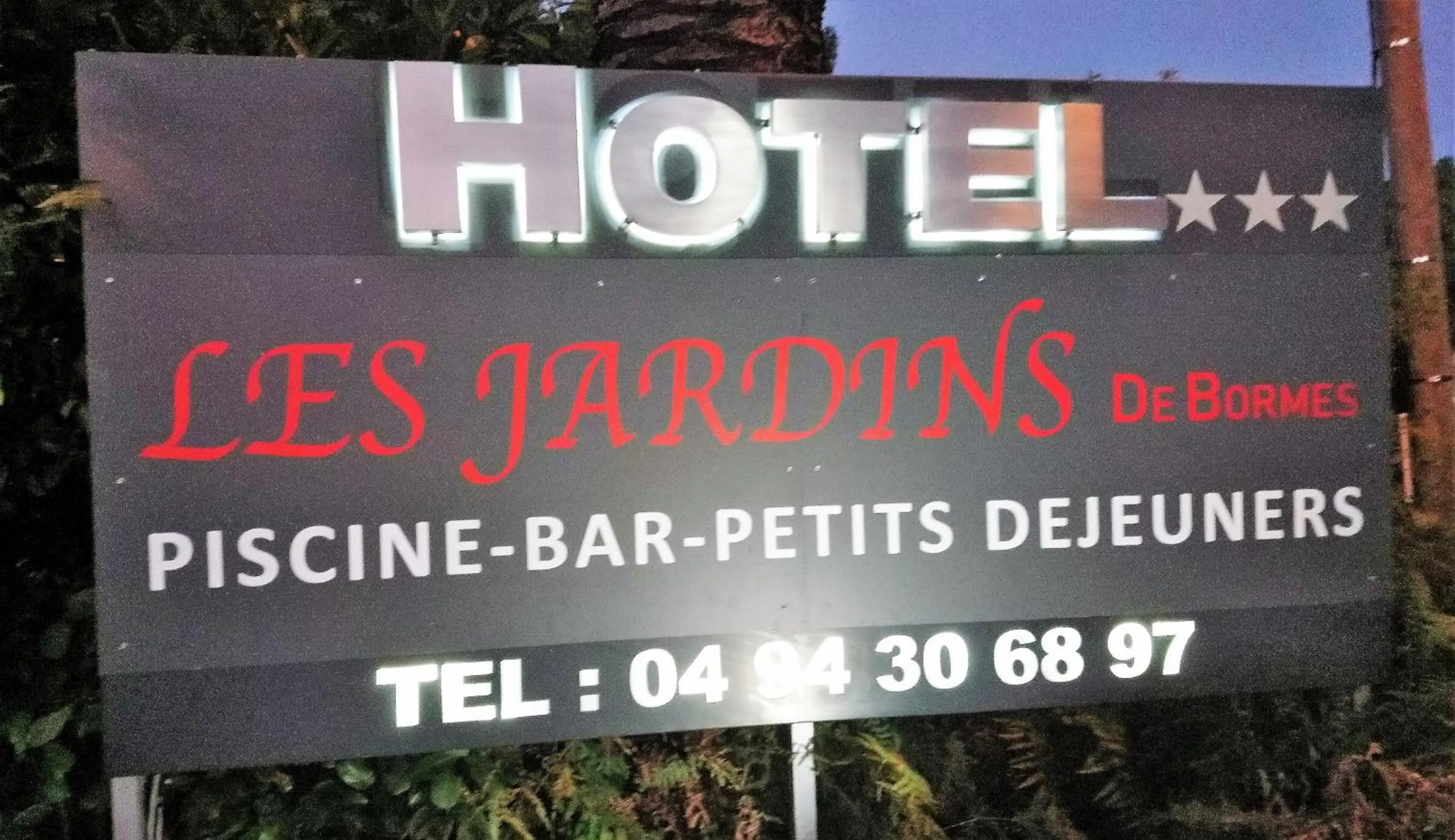 Property logo or sign in Les Jardins de Bormes, hôtel adult only avec sauna & jacuzzi