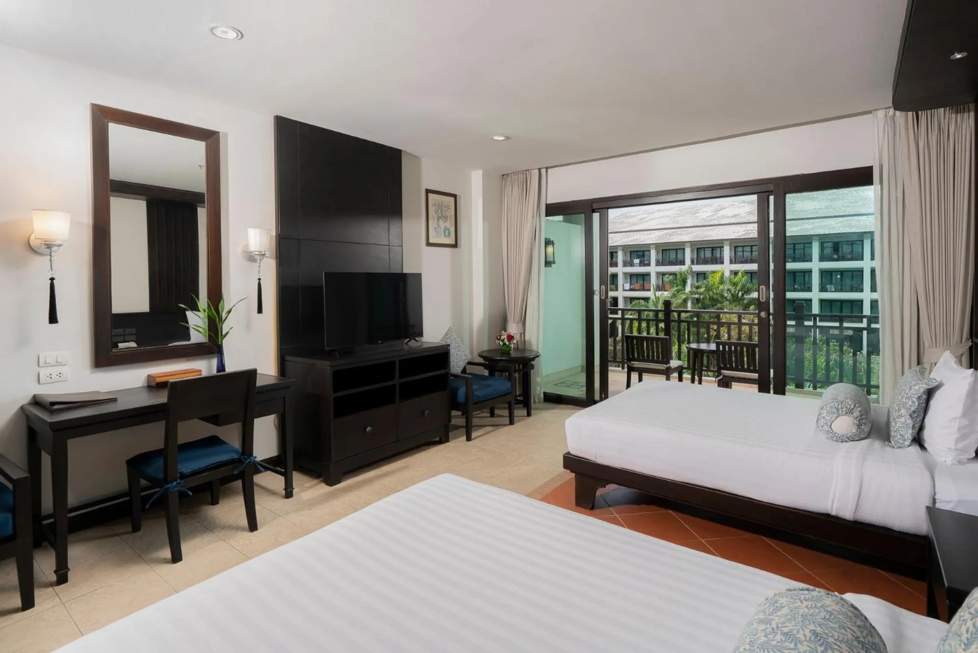 Bed in Ravindra Beach Resort & Spa - SHA Extra Plus
