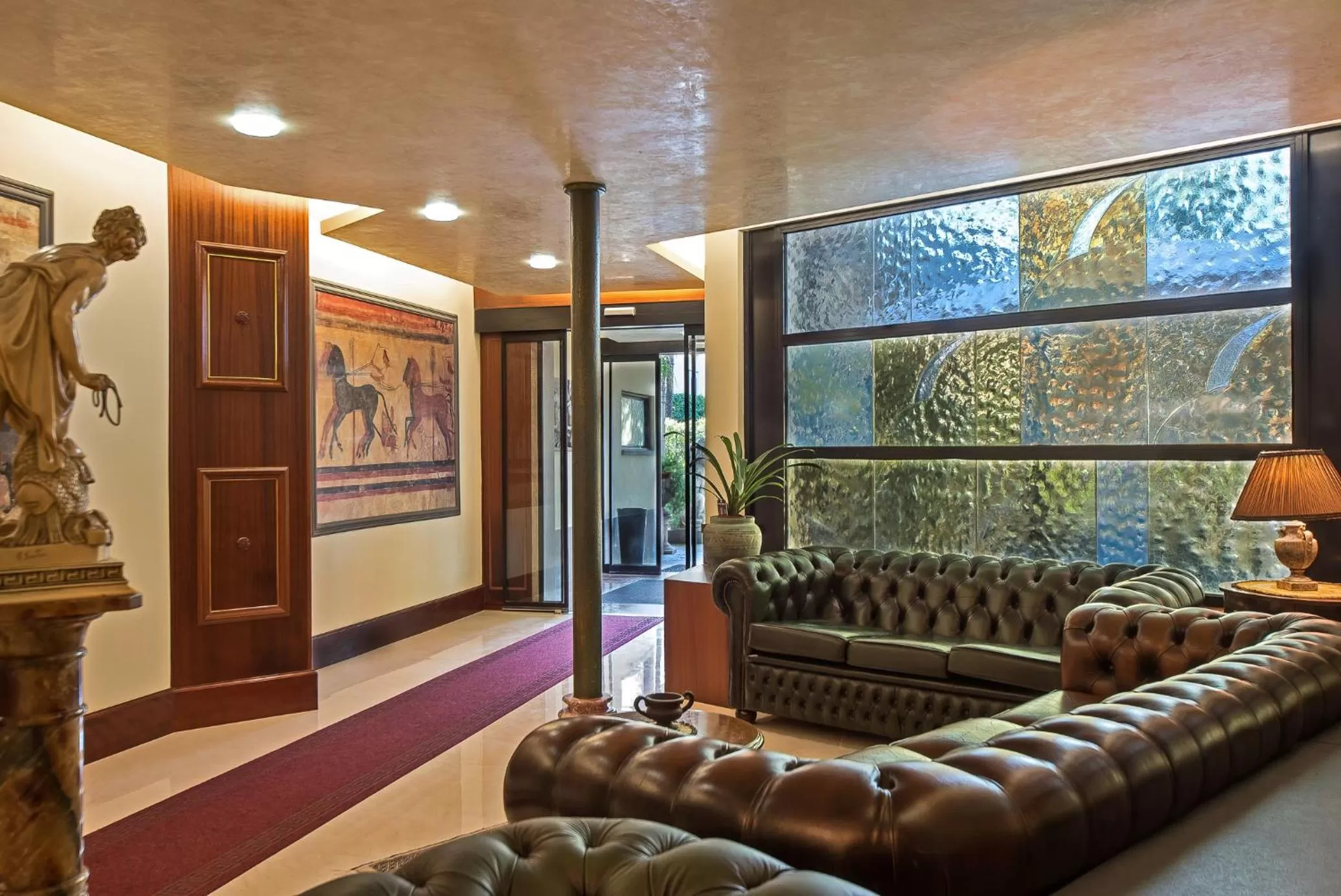 Lobby or reception in Hotel Columbus sul Lago