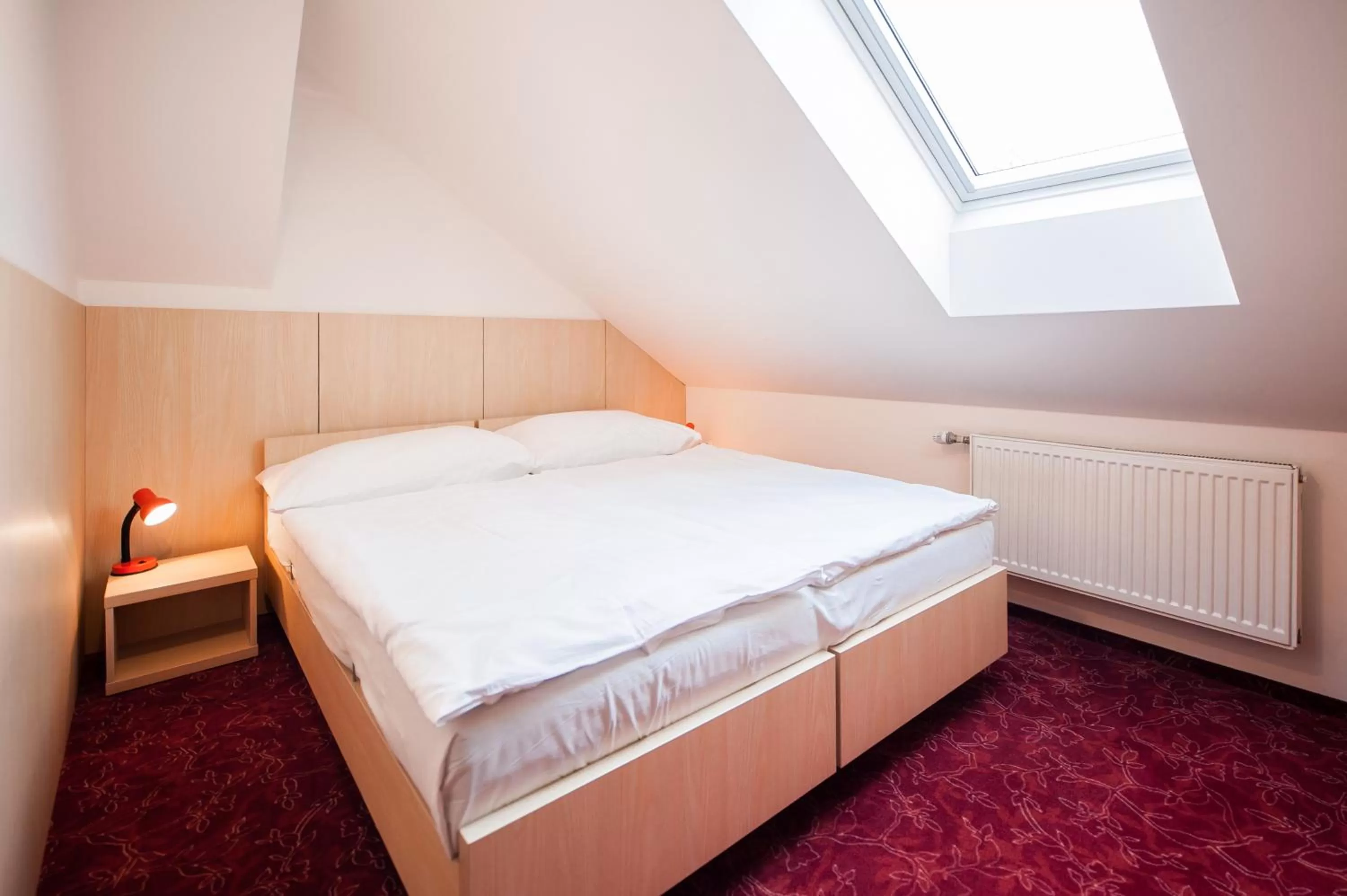 Bed in Hotel Pivovar