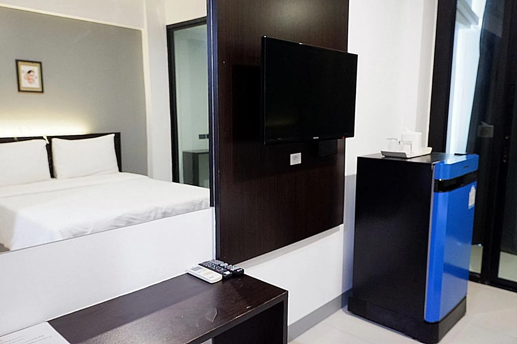 Photo of the whole room, Bed in Izen Budget Hotel & Residence