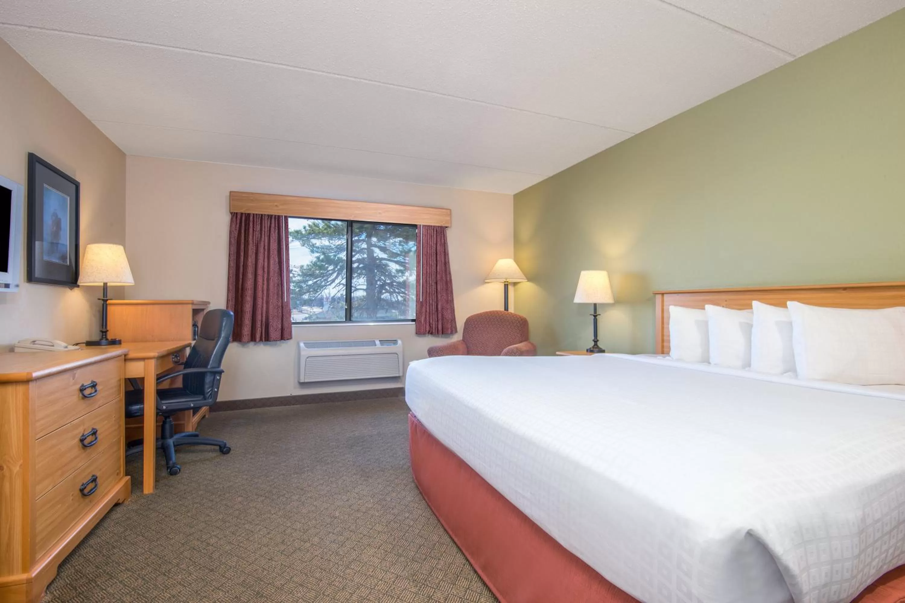Photo of the whole room, Bed in AmericInn by Wyndham Pampa Event Center