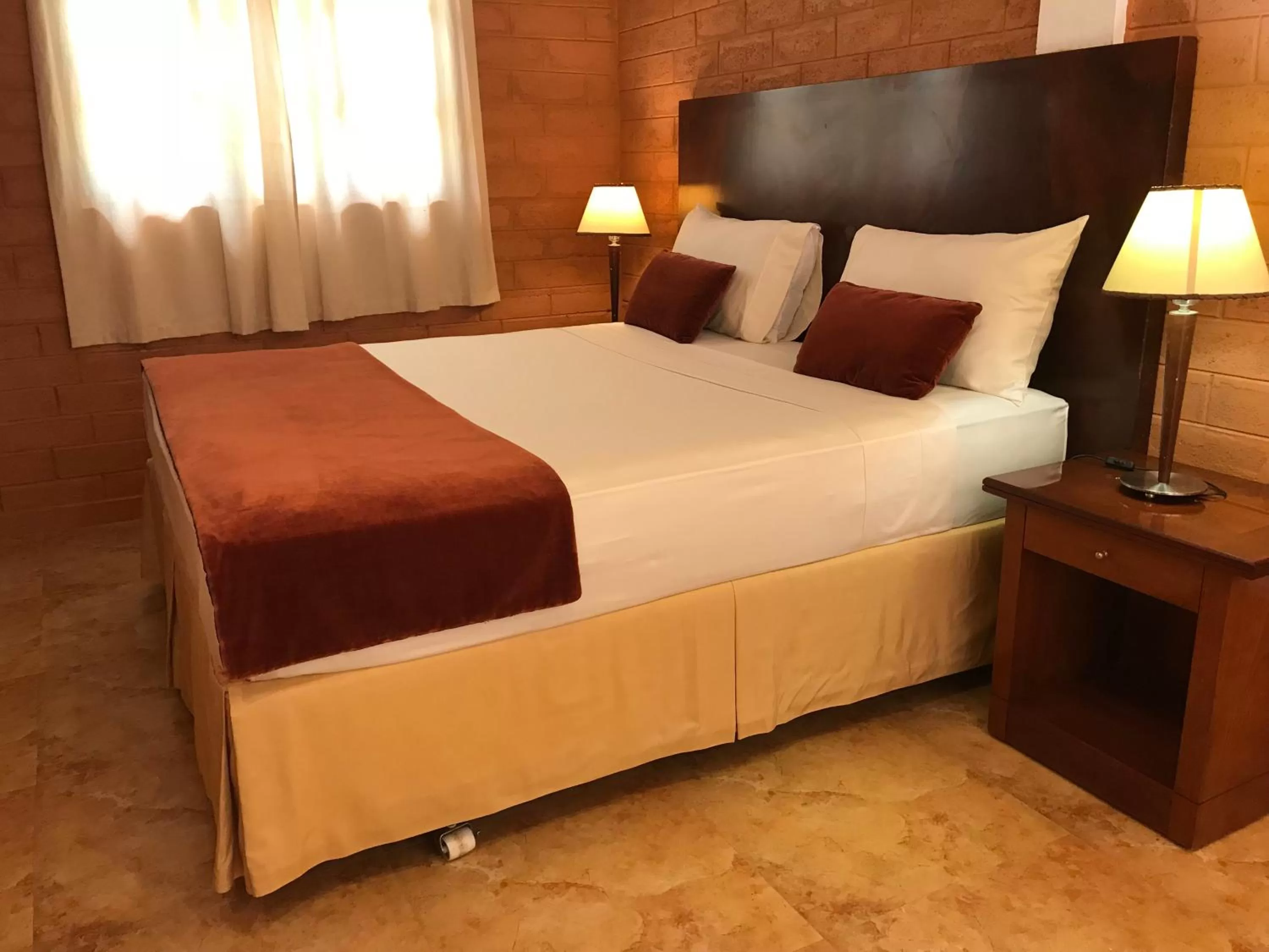 Bed in Hotel 4 U Saliya Garden