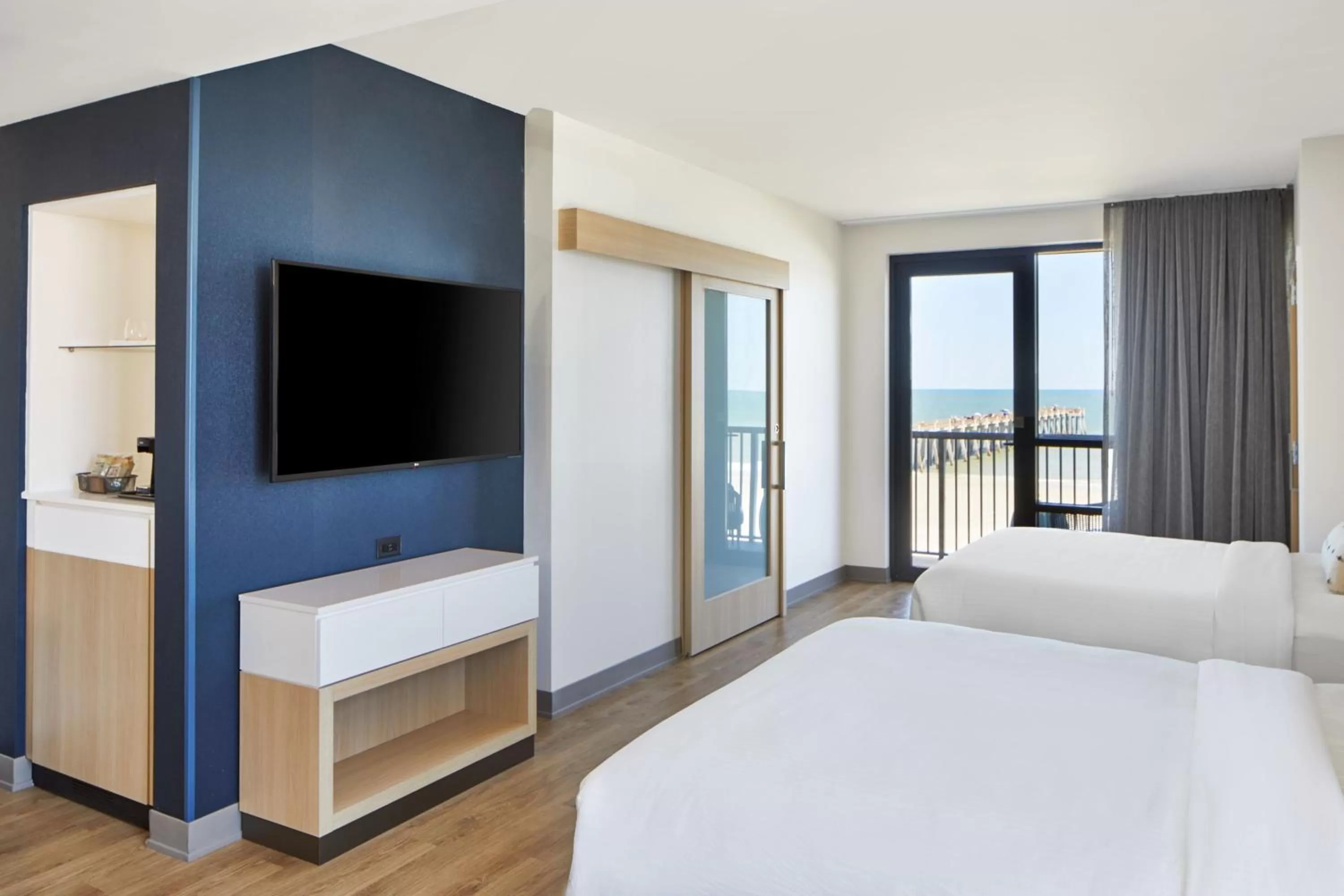 Photo of the whole room, Bed in SpringHill Suites by Marriott Jacksonville Beach Oceanfront