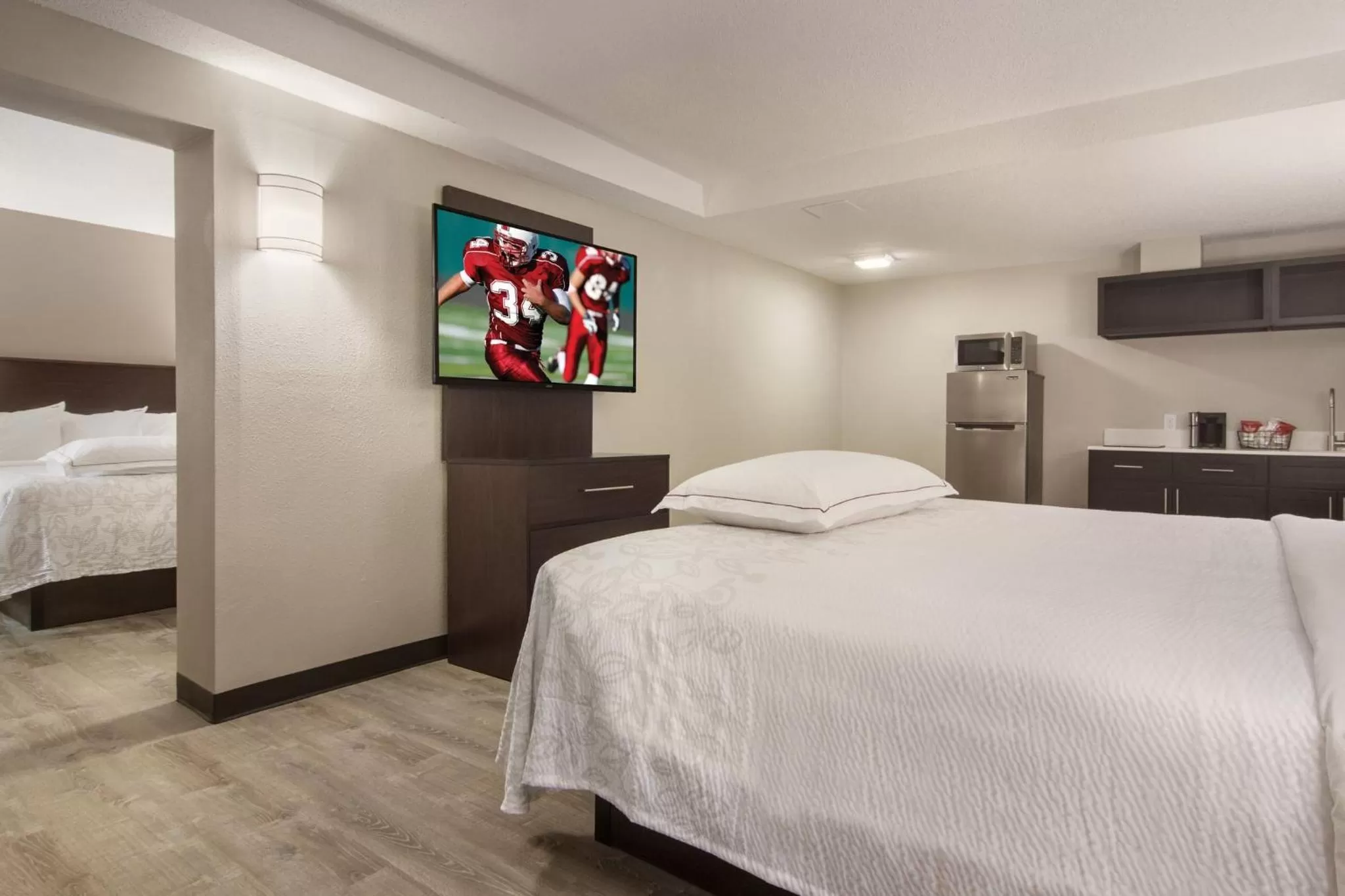 Photo of the whole room, Bed in Red Roof Inn PLUS & Suites Erie