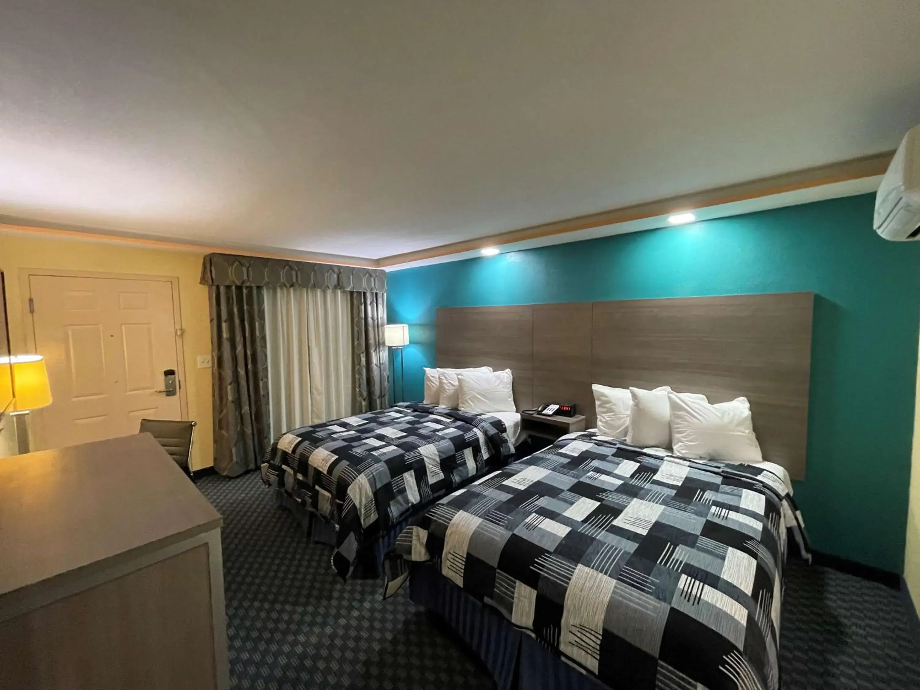 Double Room with Two Double Beds and Mobility Accessible Roll-In Shower in SureStay Plus Hotel by Best Western Odessa Double Room with Two Double Beds and Mobility Accessible Roll-In Shower in SureStay Plus Hotel by Best Western Odessa