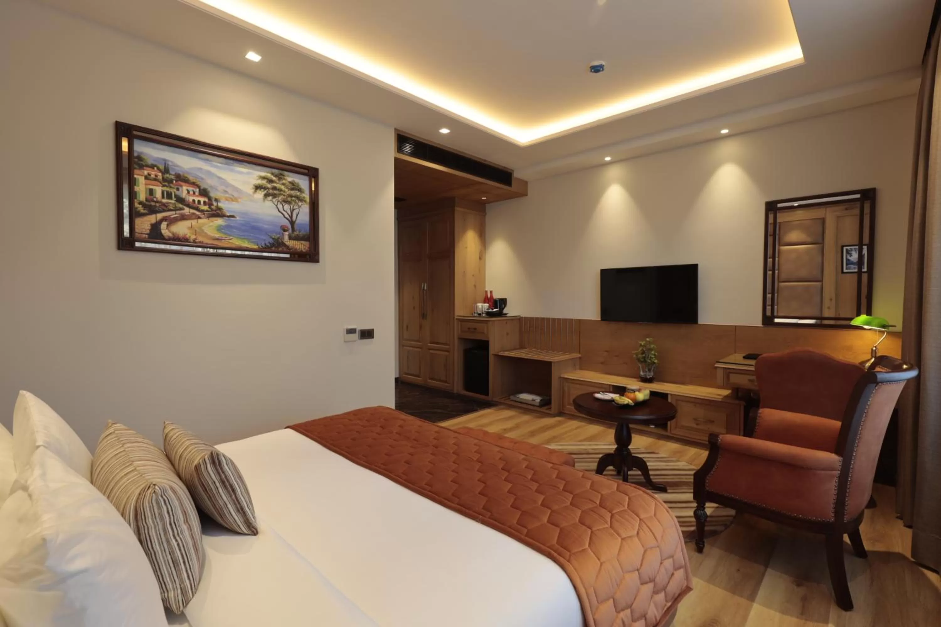 Photo of the whole room, Bed in WelcomHeritage Elysium Resort & Spa