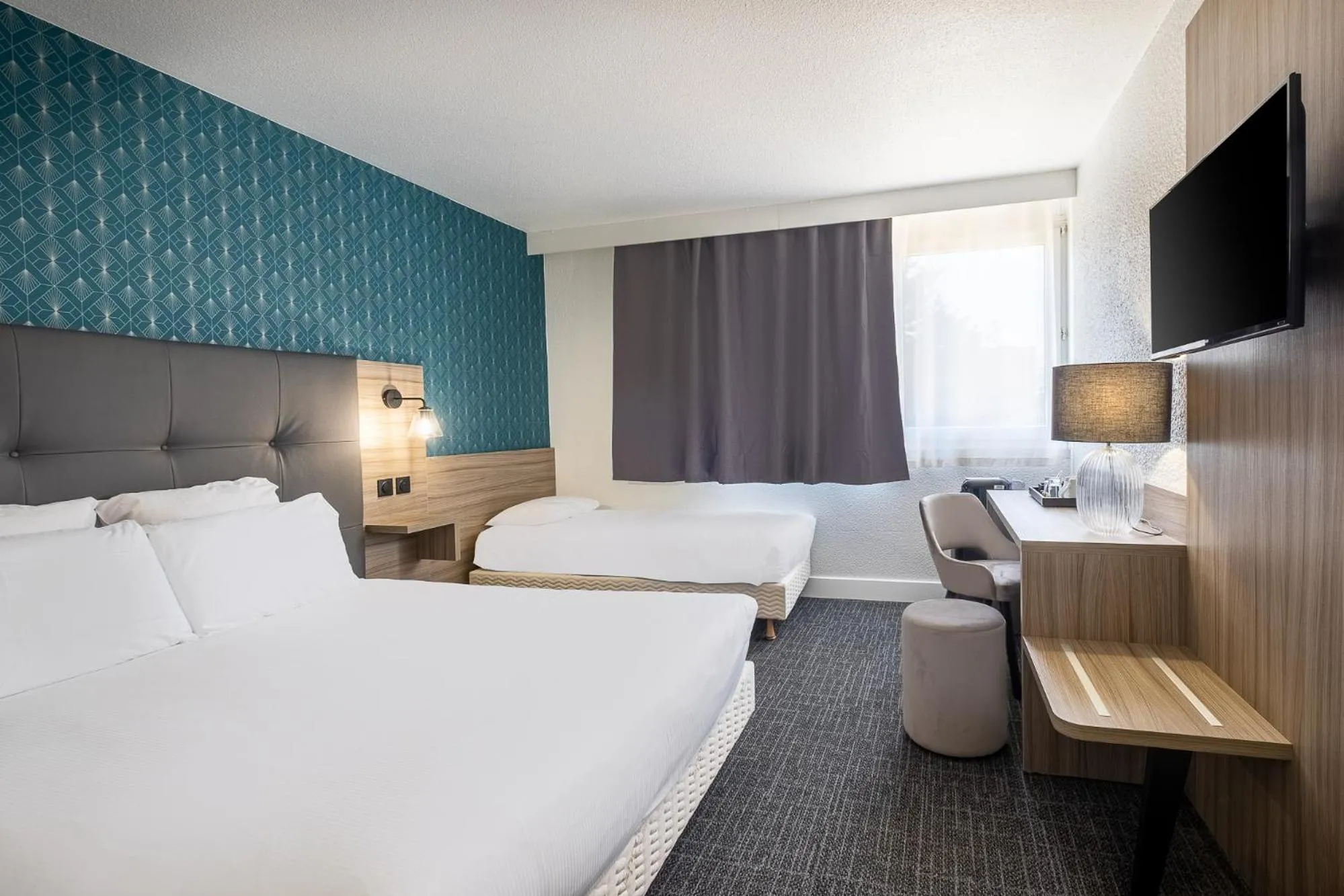 Photo of the whole room, Bed in Hôtel Akena Poitiers Nord Futuroscope