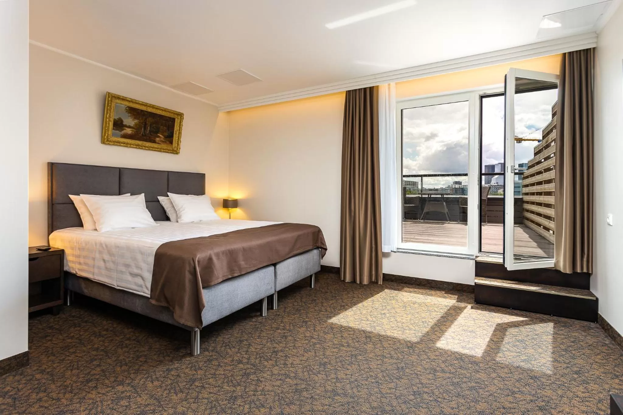 Bed in Adoryal Hotell