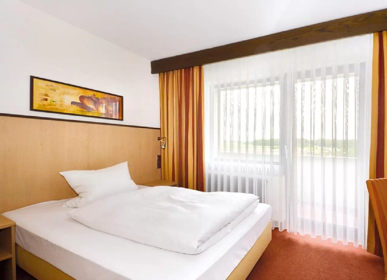 Bed in Seligweiler Hotel & Restaurant