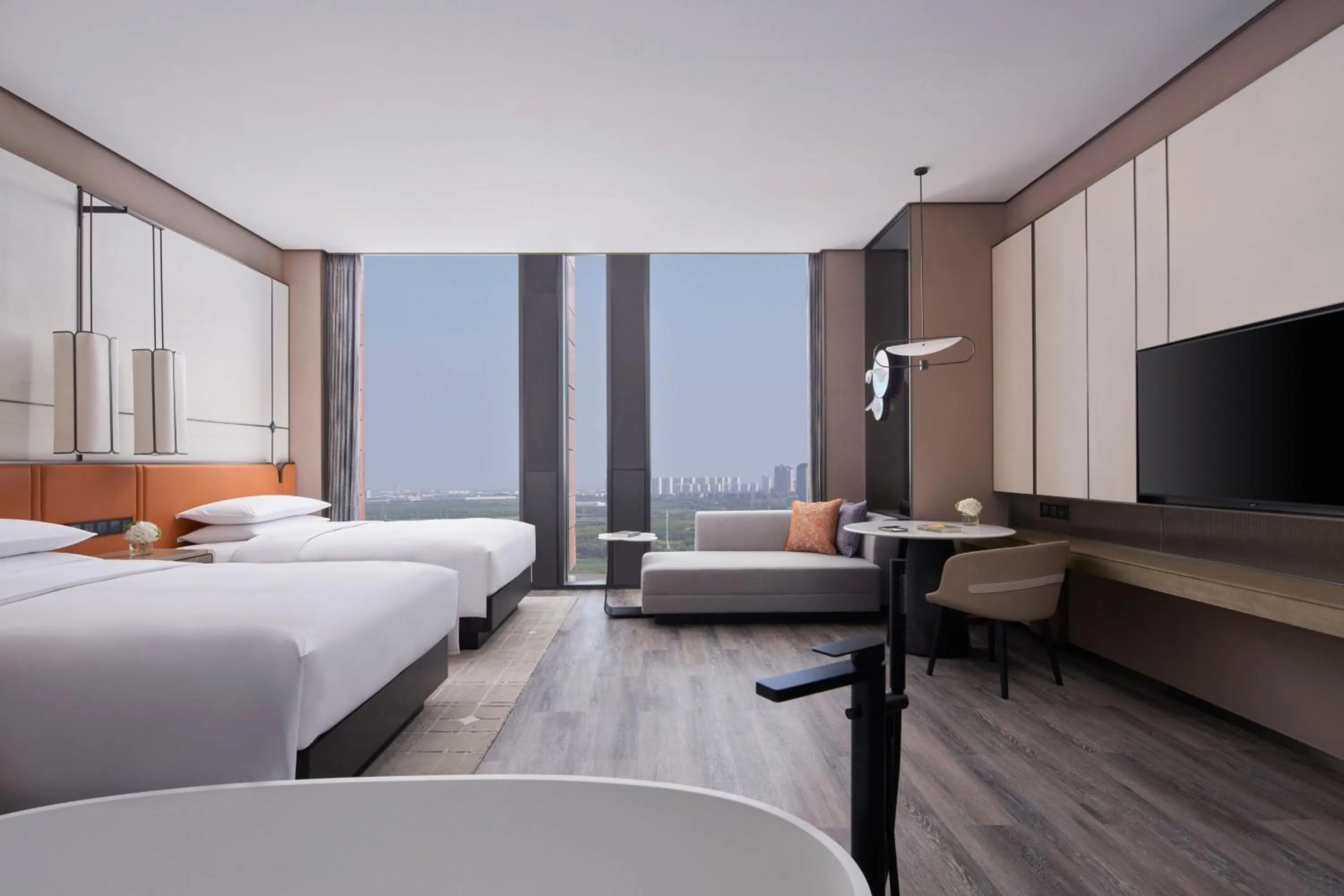 Photo of the whole room, Bed in Tianjin Marriott Hotel National Convention and Exhibition Center