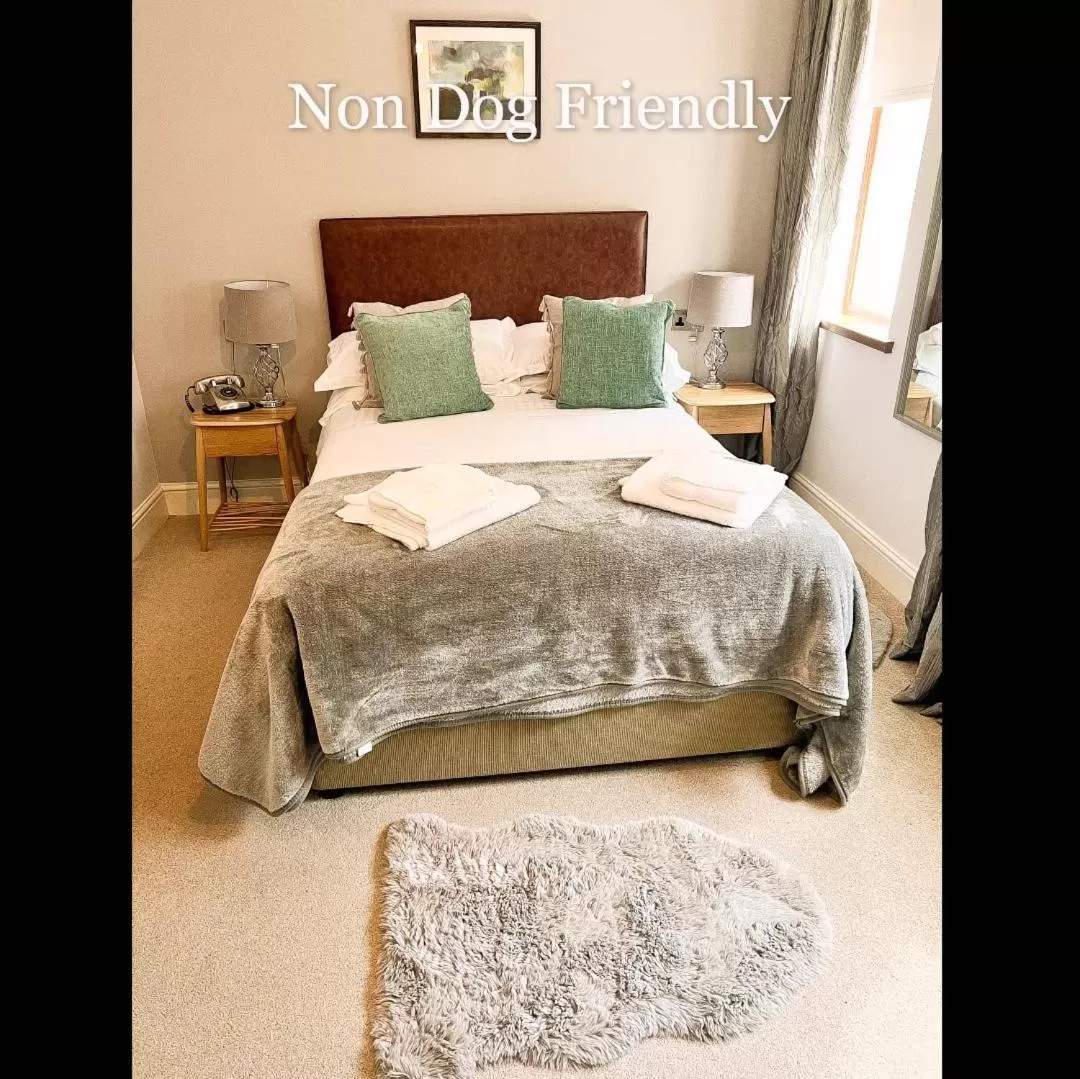 Bed in The Gower Hotel