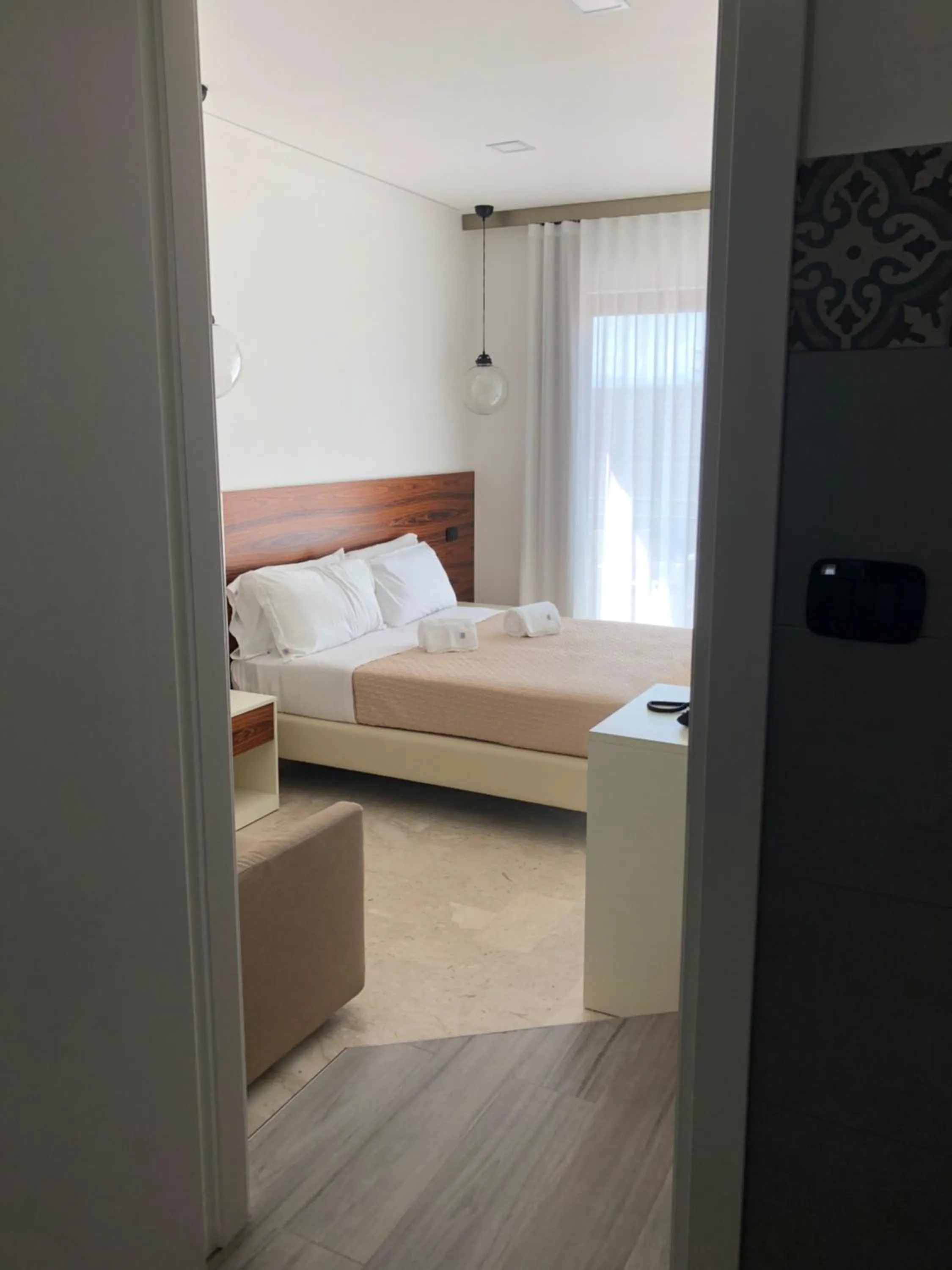 Bed in Albergo Milazzo Inn AiMori