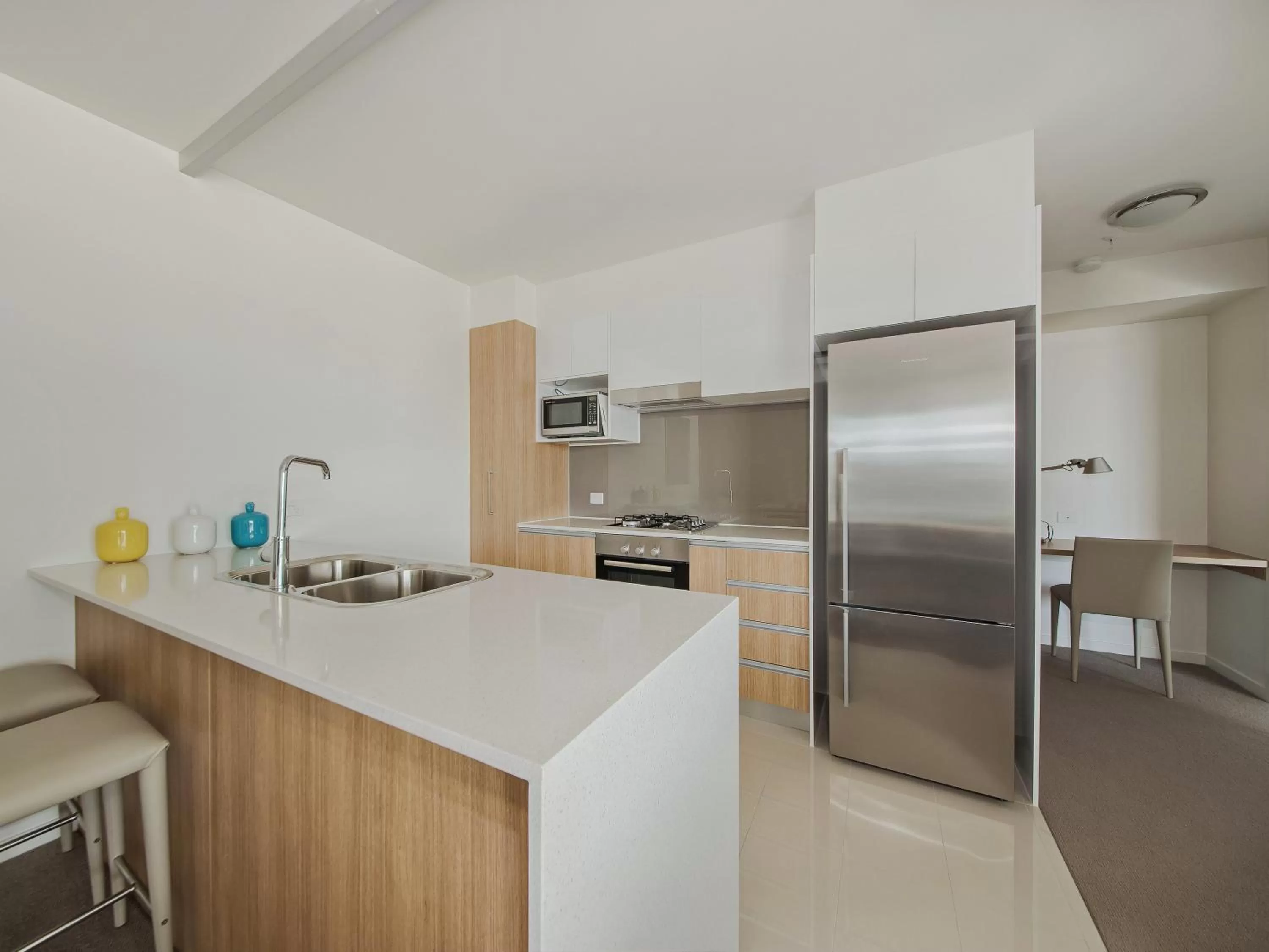 Kitchen or kitchenette in Link Portside Wharf Apartment Hotel
