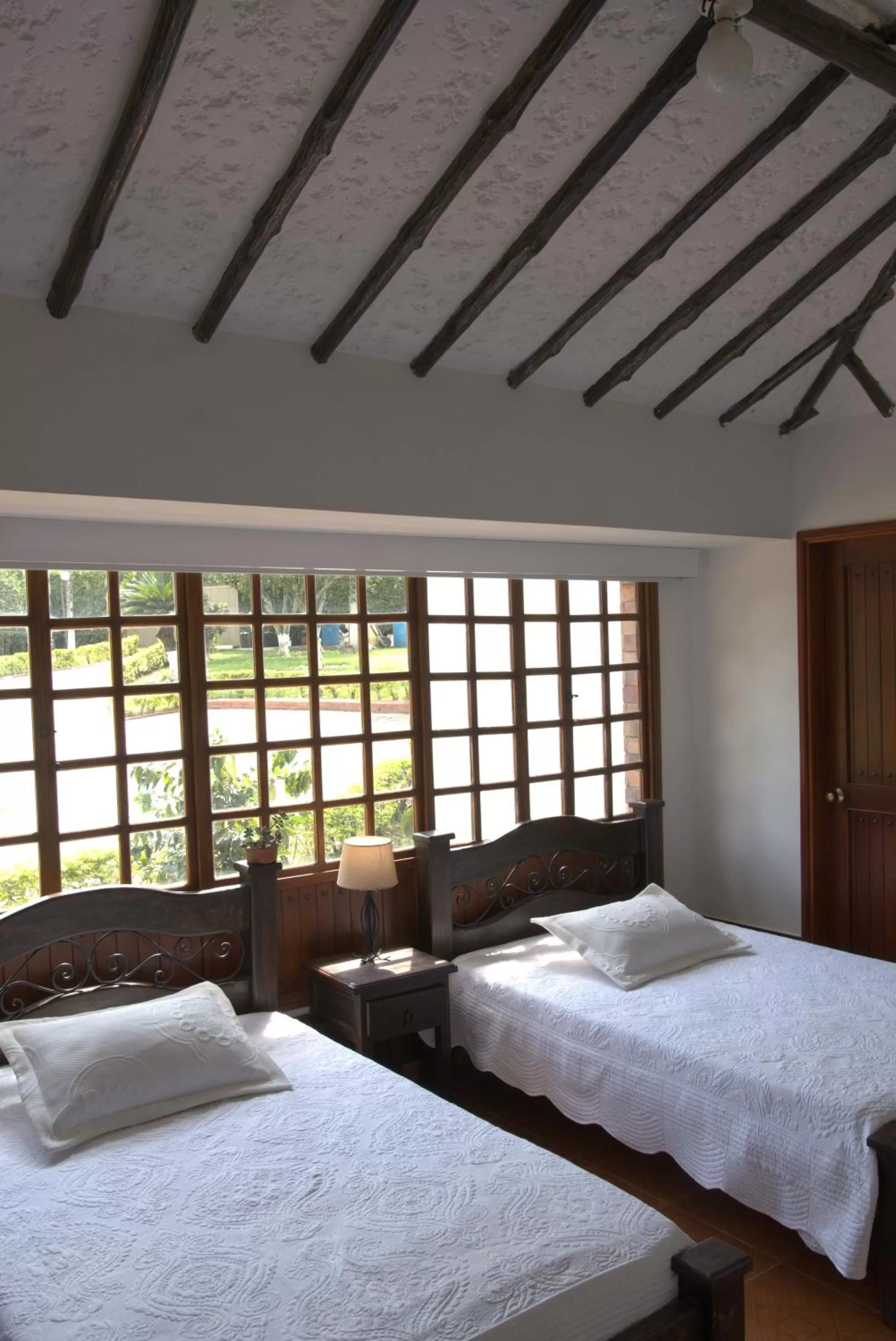 Bed in Hotel Chalet El Castillo by Majuva