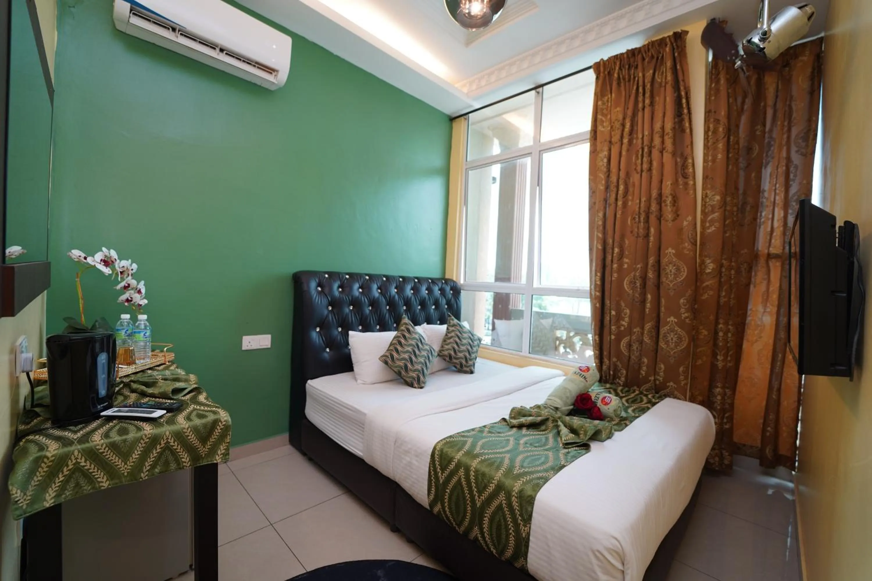 Bed in Ghazrin's Classic Hotel JB