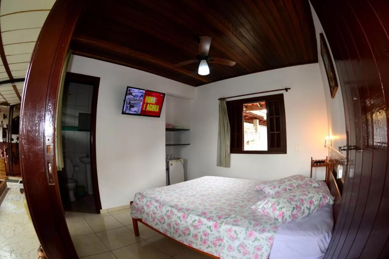 Bed in Cantinho da Geisa - suítes mobiliadas