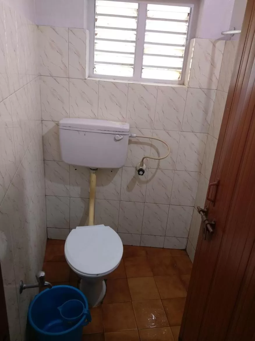 Bathroom in Anandan Tourist Home