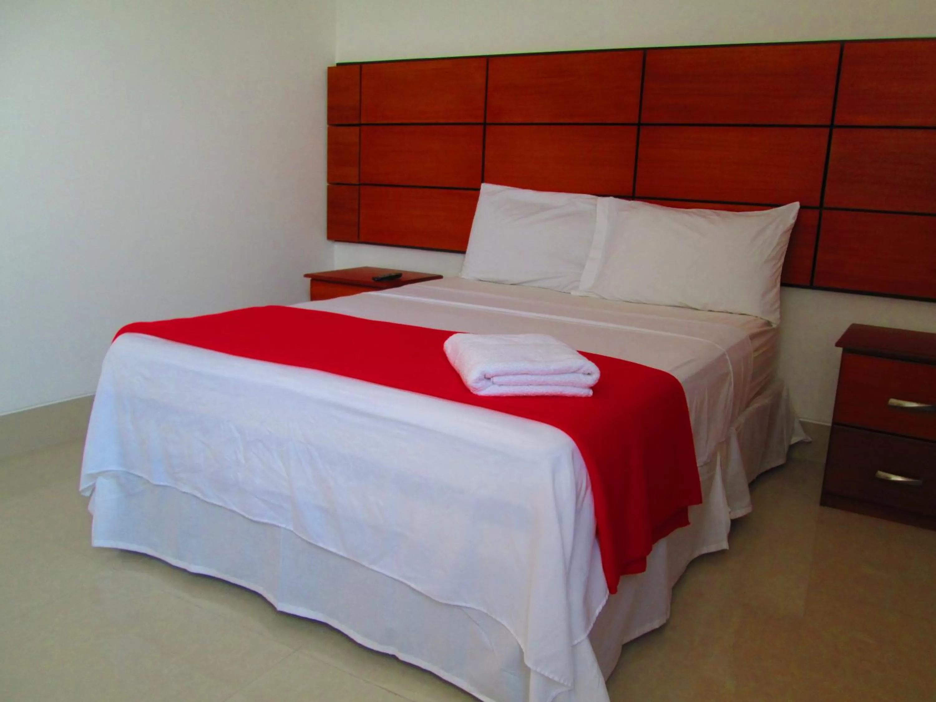 Photo of the whole room, Bed in Hotel Apart Guayaquil Aeropuerto