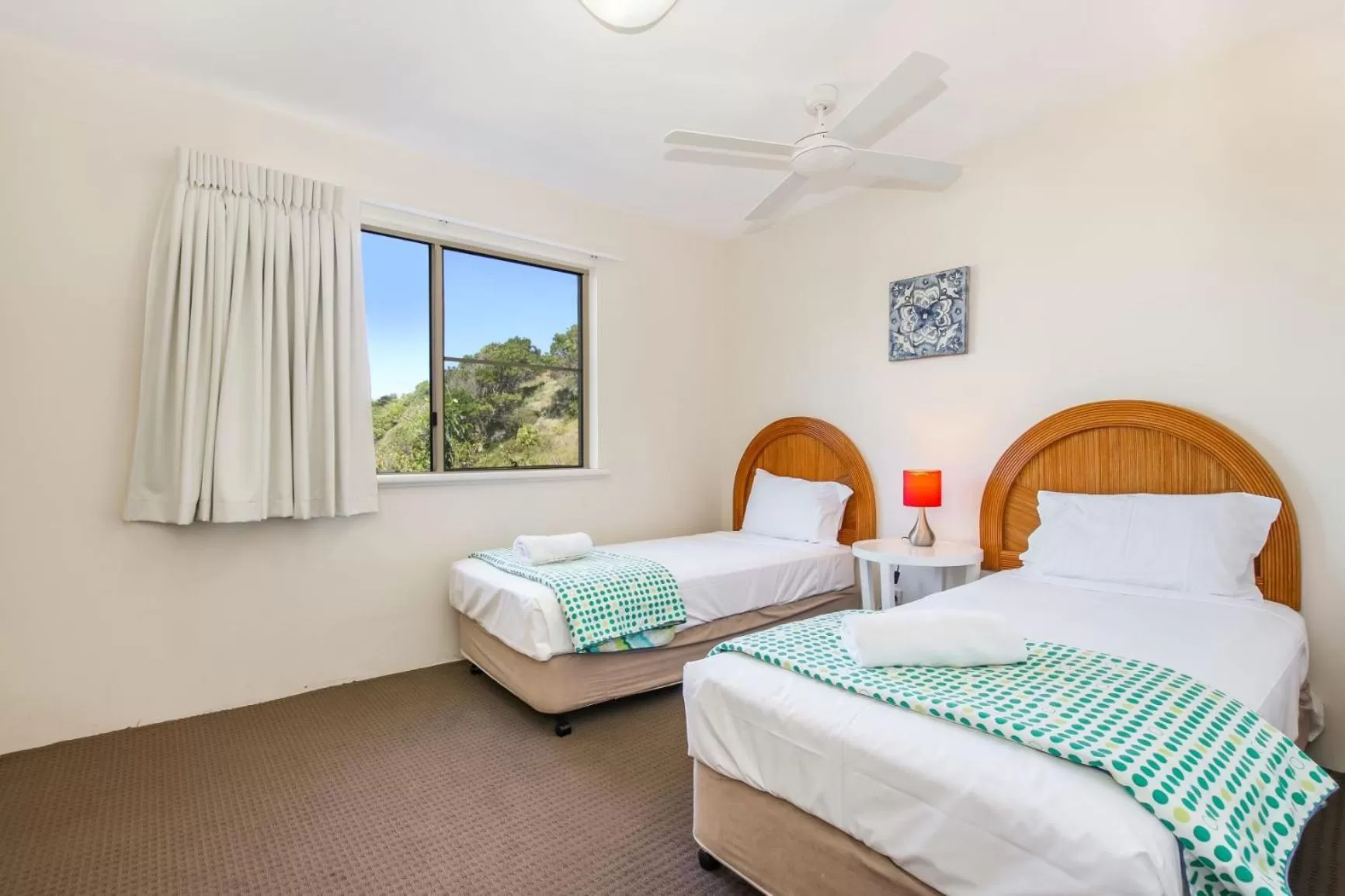 Bed in Lennox Beach Resort