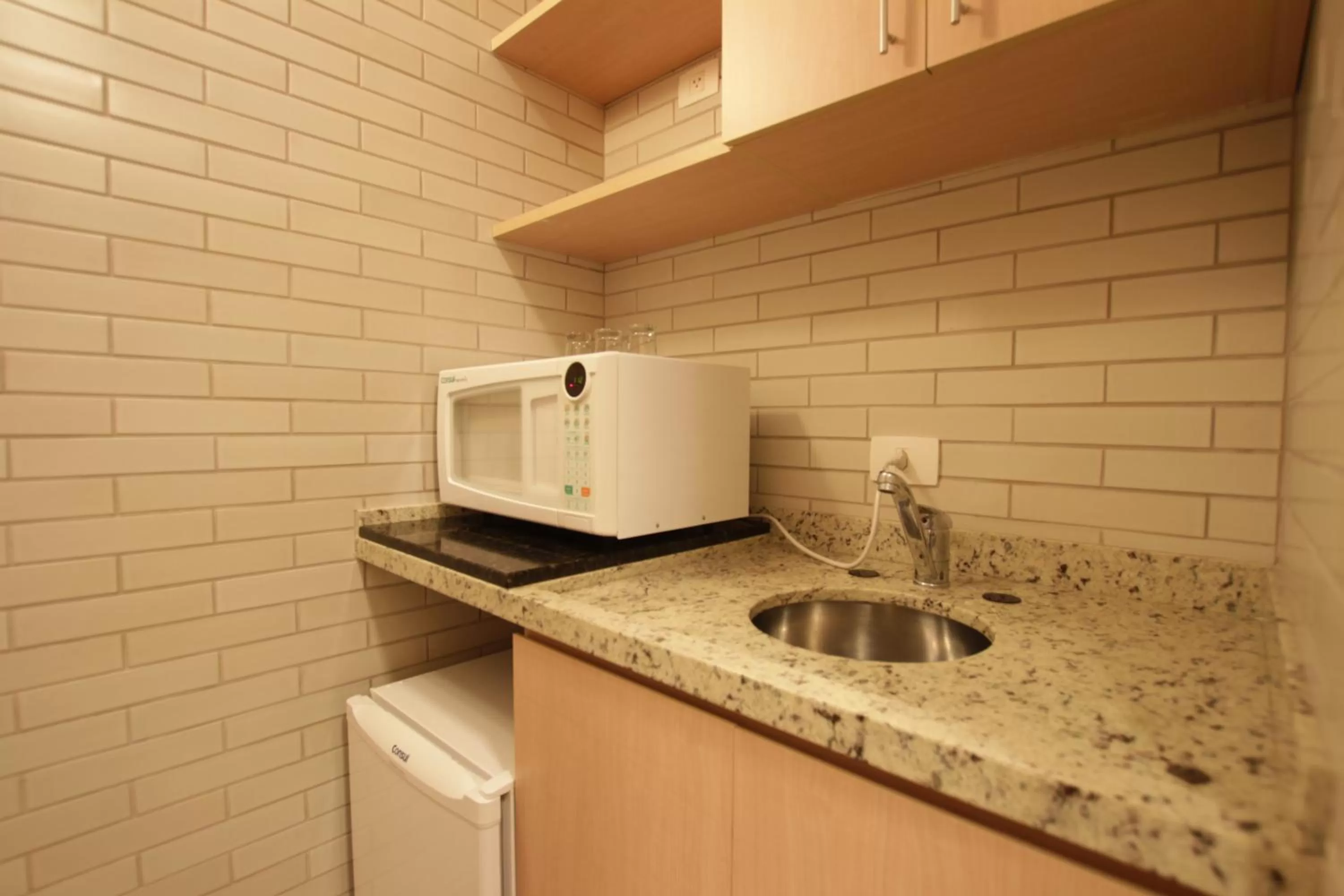 Kitchen or kitchenette in Hotel Confiance Centro Cívico